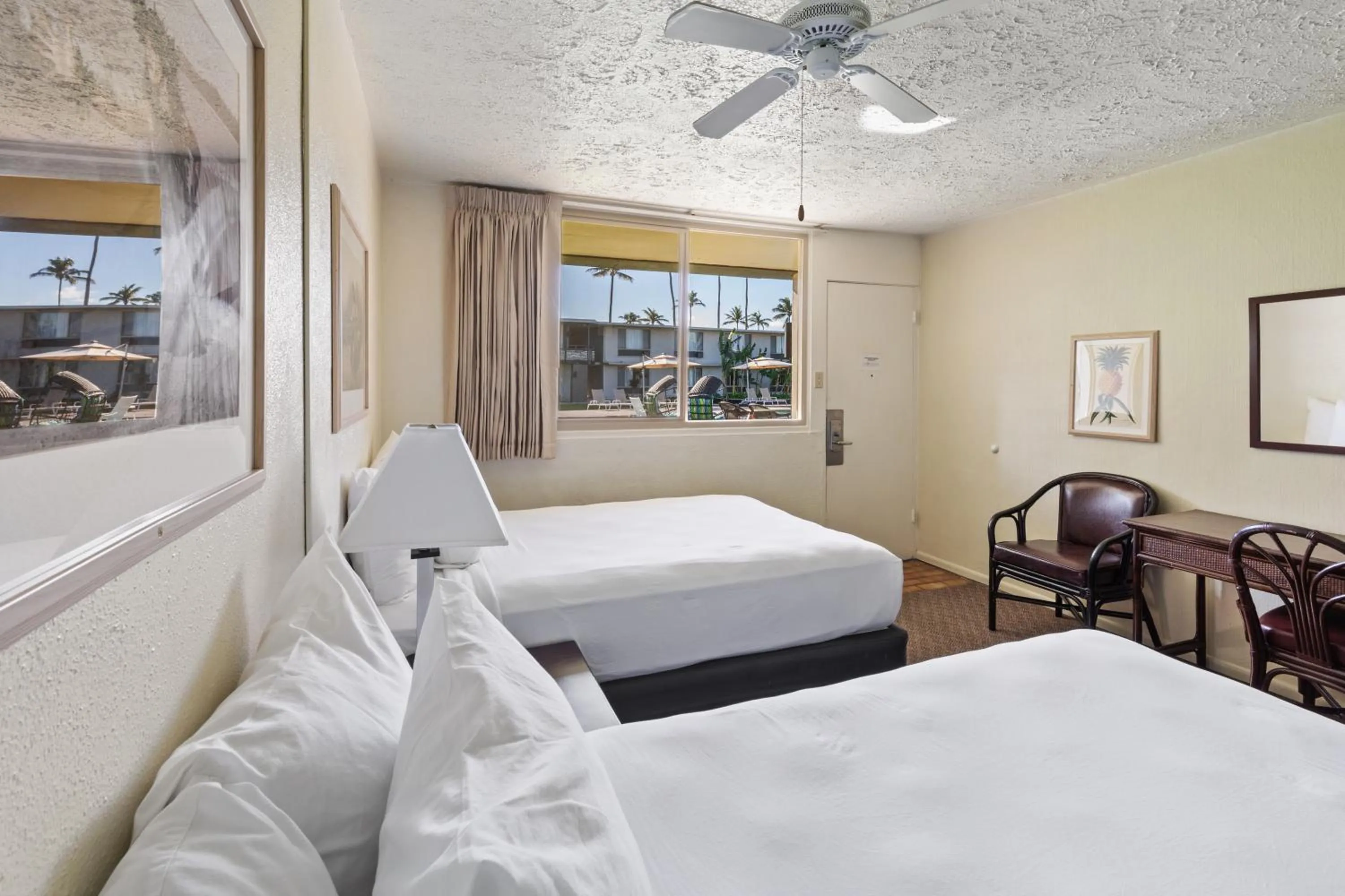 Bed in Maui Seaside Hotel