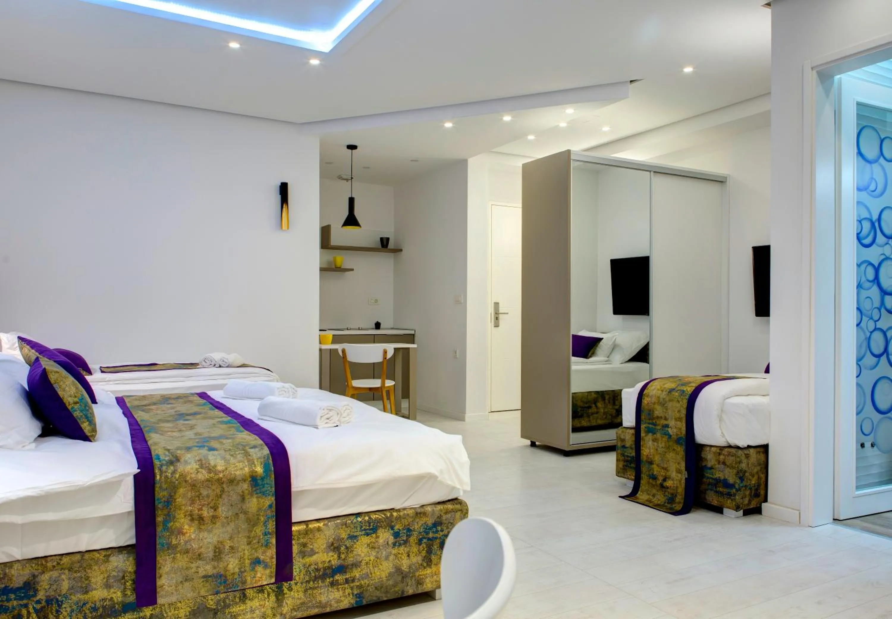 Bed in Diamond Rain Boutique Hotel