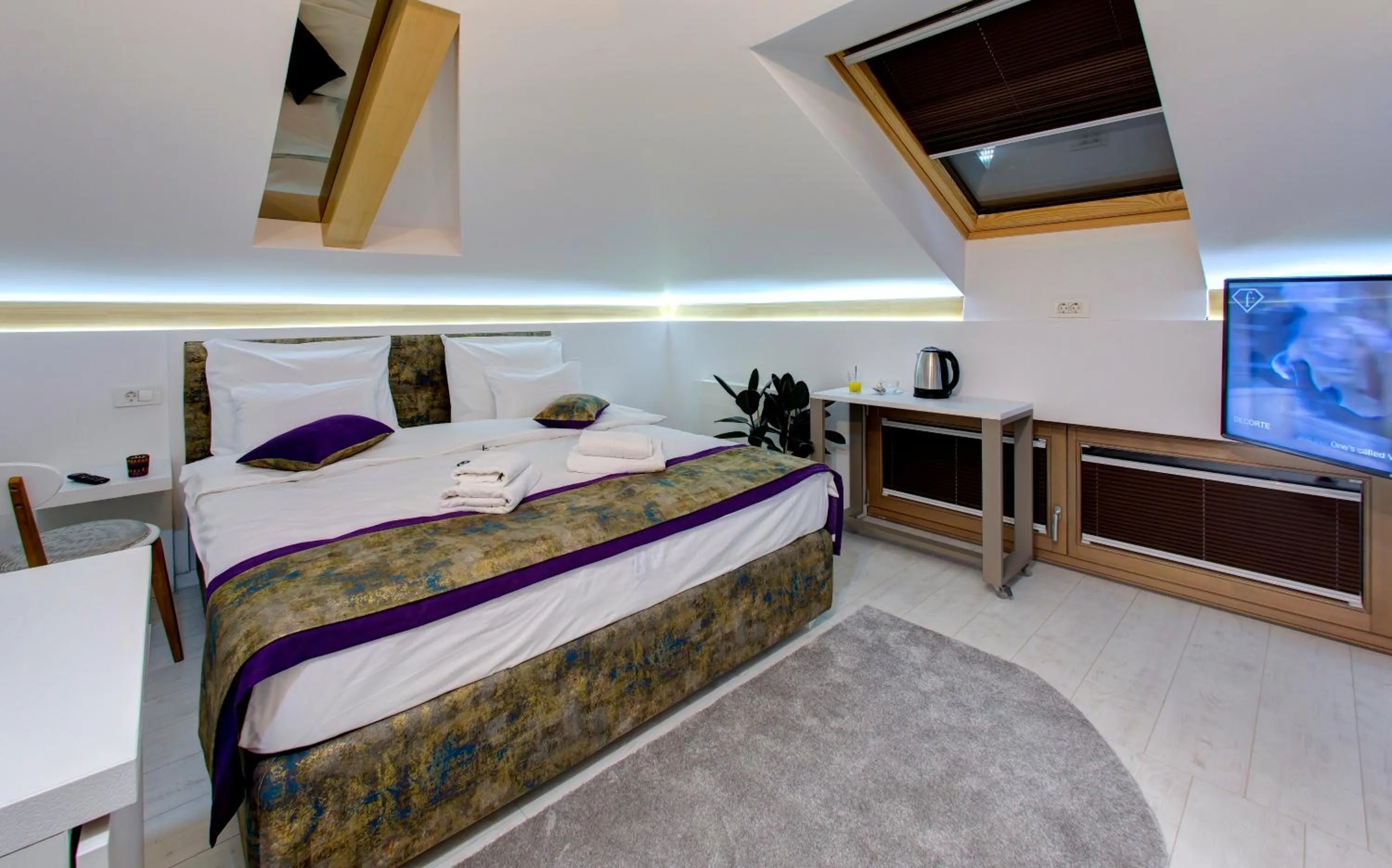 Bed in Diamond Rain Boutique Hotel