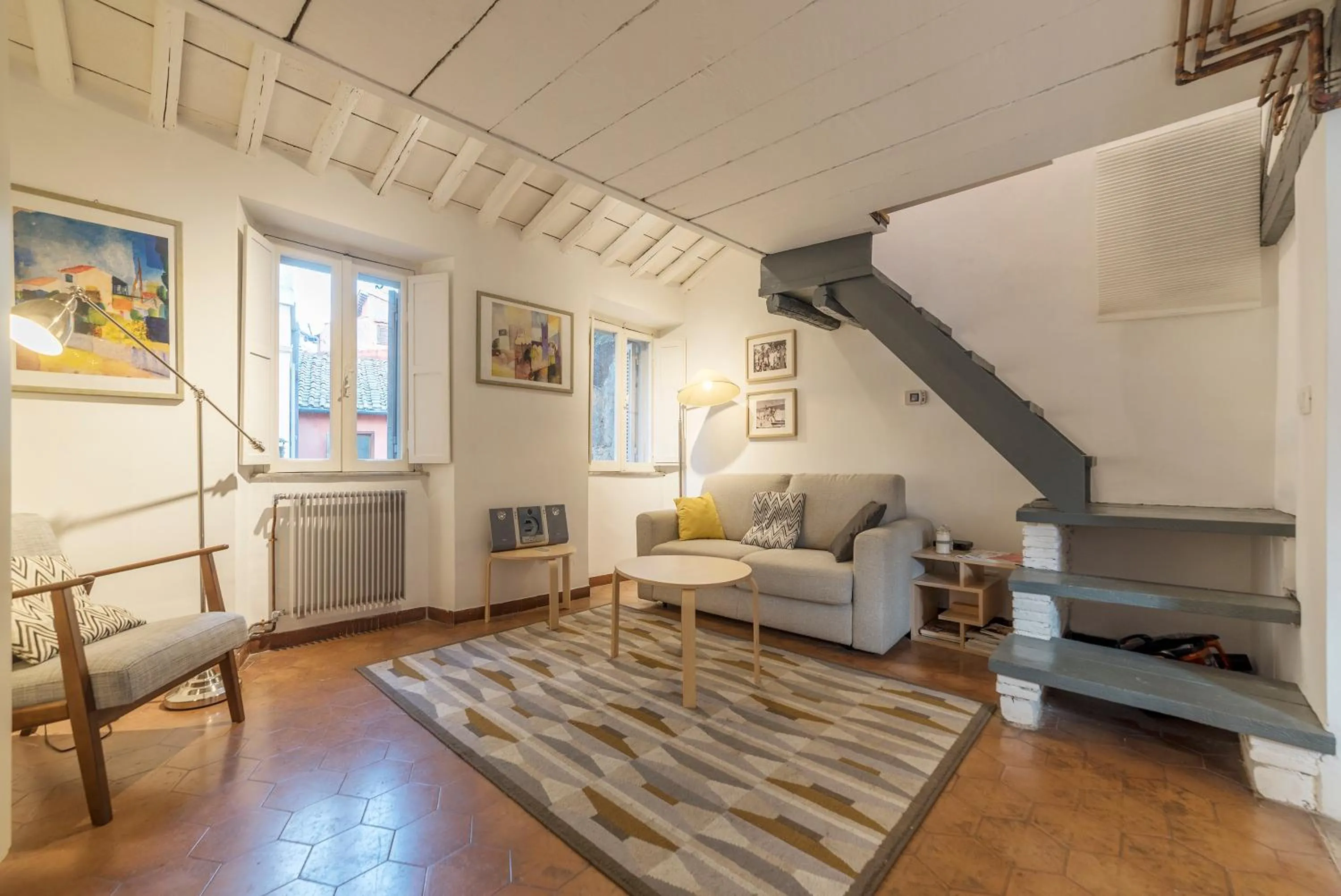Living room in GuestHost - Charming Loft Navona