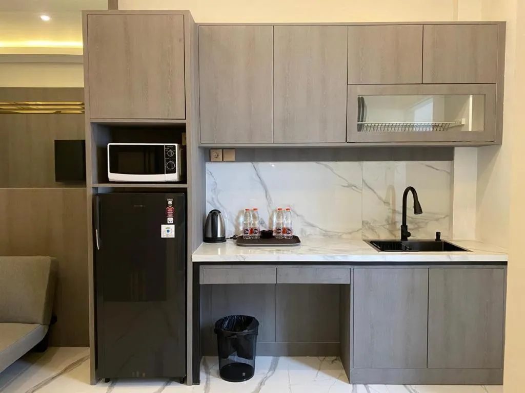 Kitchen or kitchenette in panfila hotel