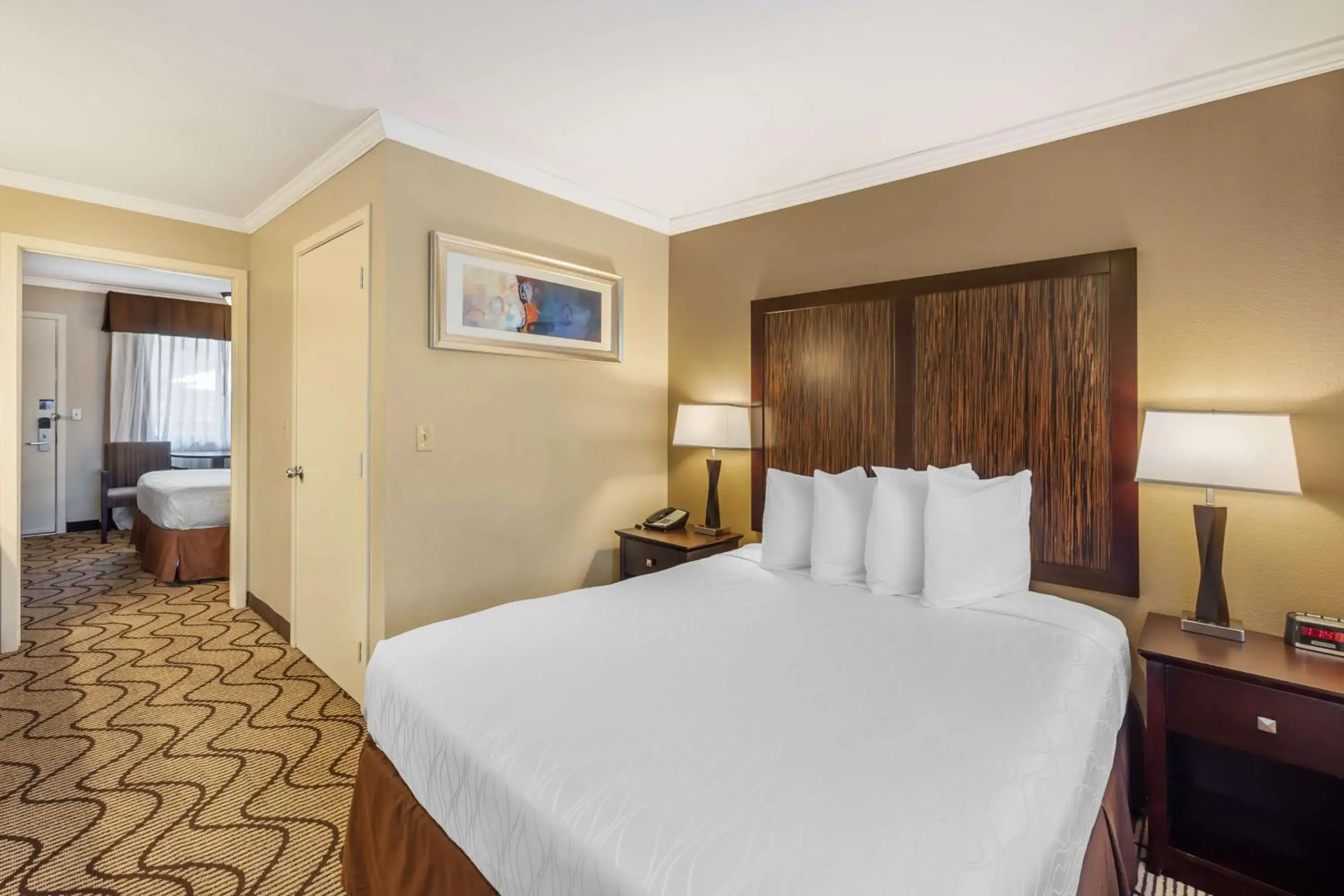 Bedroom, Bed in Best Western Plus Orchid Hotel & Suites Bedroom, Bed in Best Western Plus Orchid Hotel & Suites