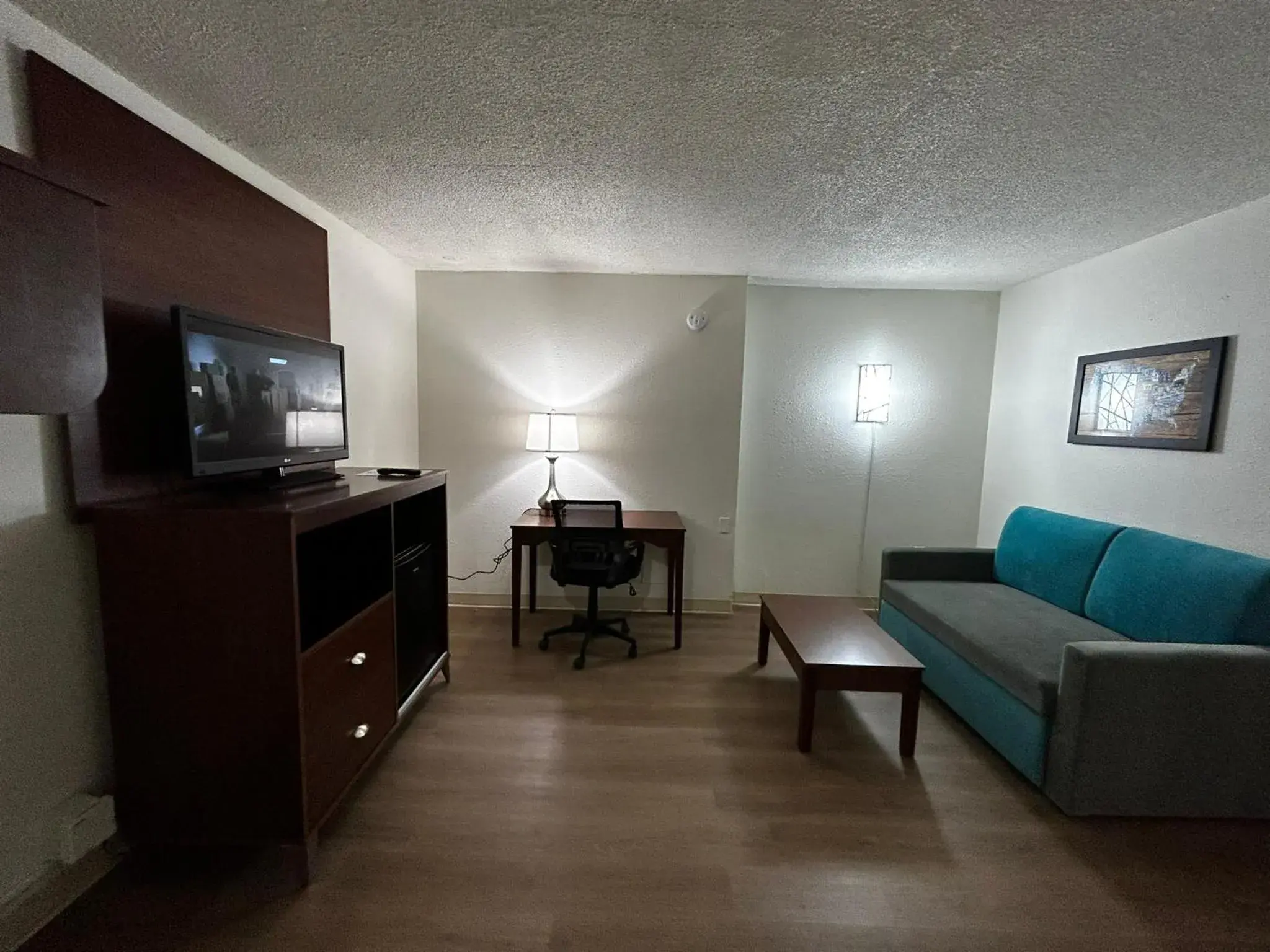 TV and multimedia, Seating Area in Econo Lodge Inn & Suites