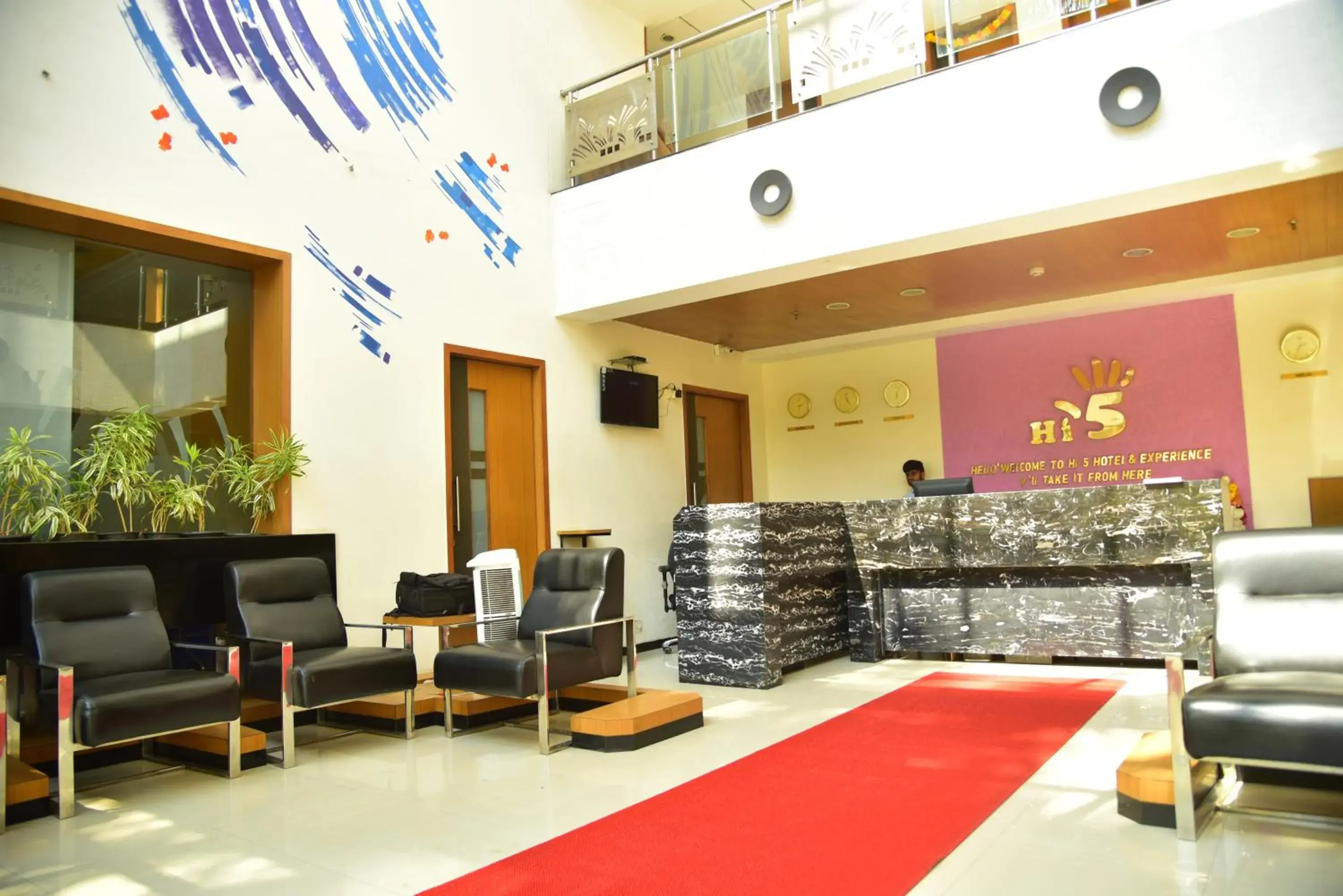 Lobby or reception in Hi 5 Hotel & Experience Lobby or reception in Hi 5 Hotel & Experience