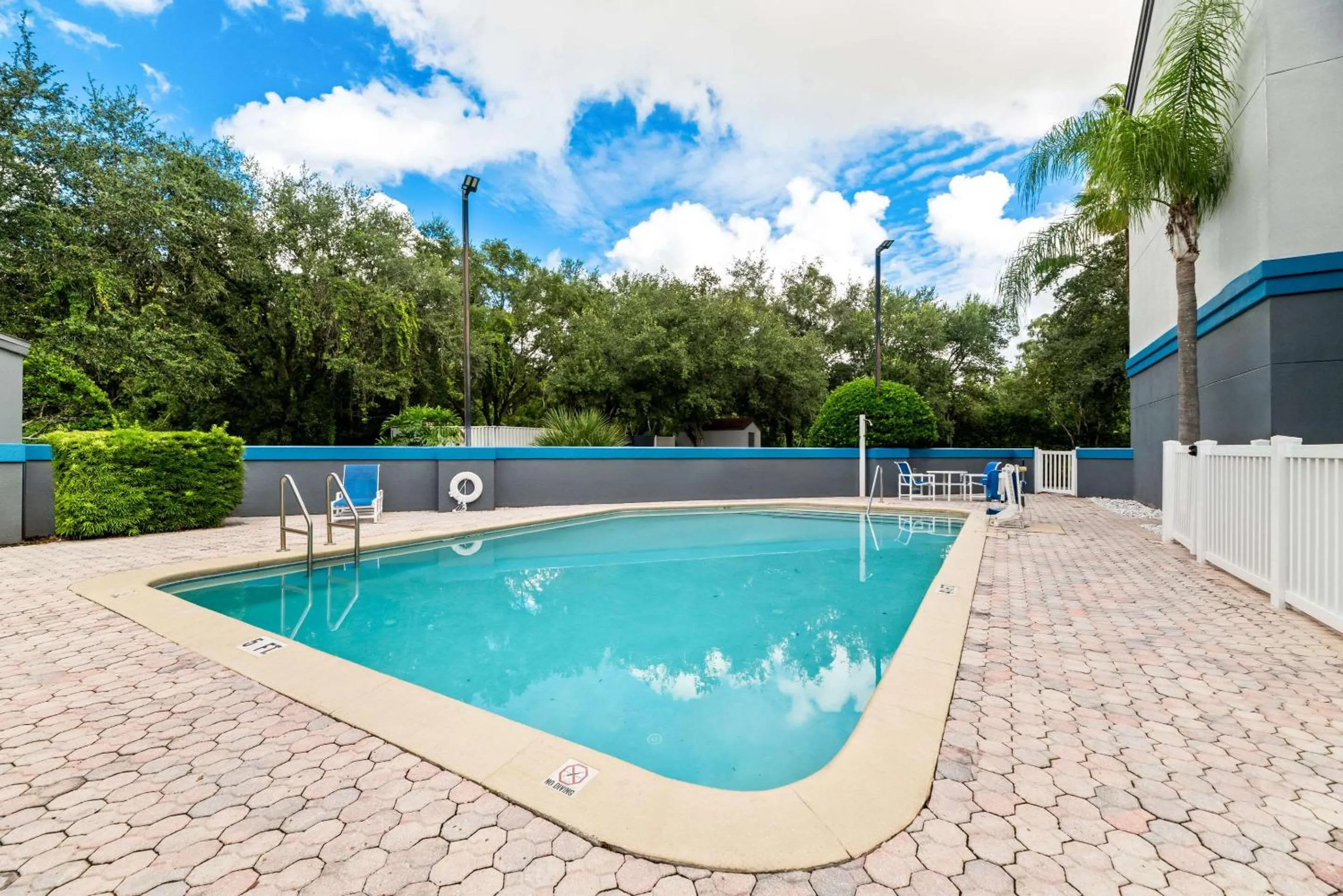 Swimming pool in OYO Townhouse Orlando West