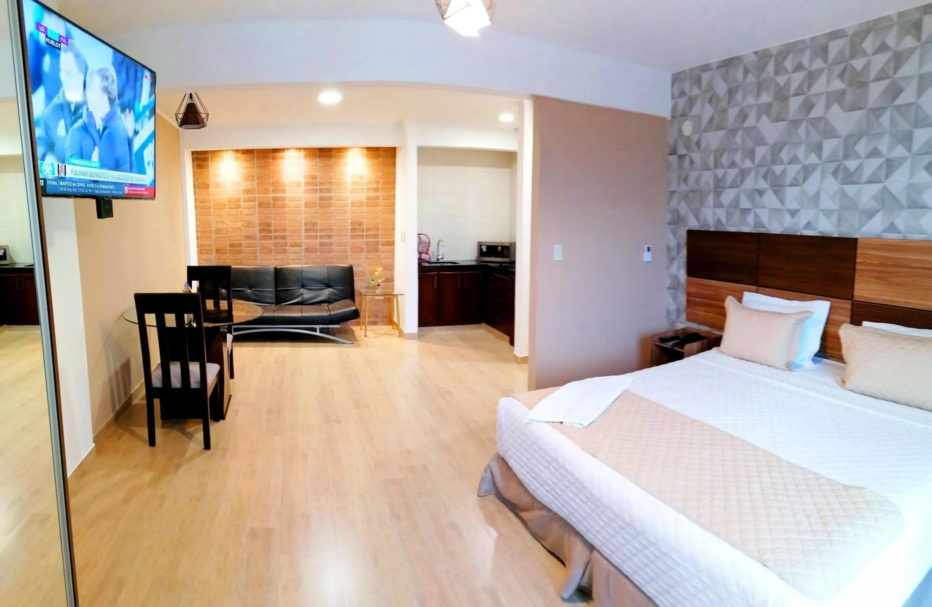 Bed in Premium Suites Deluxe Aparthotel Equipetrol