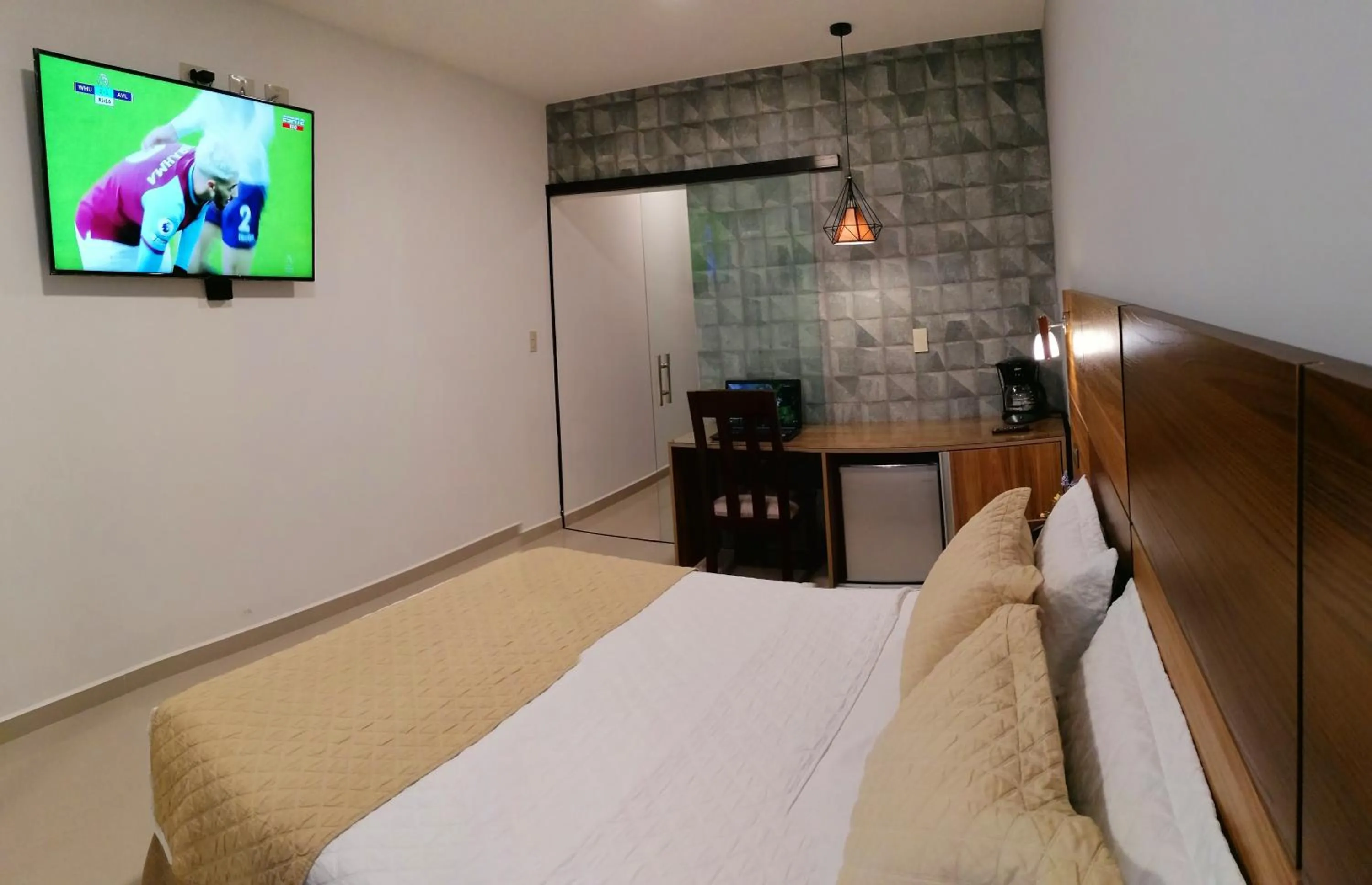 Bed in Premium Suites Deluxe Aparthotel Equipetrol