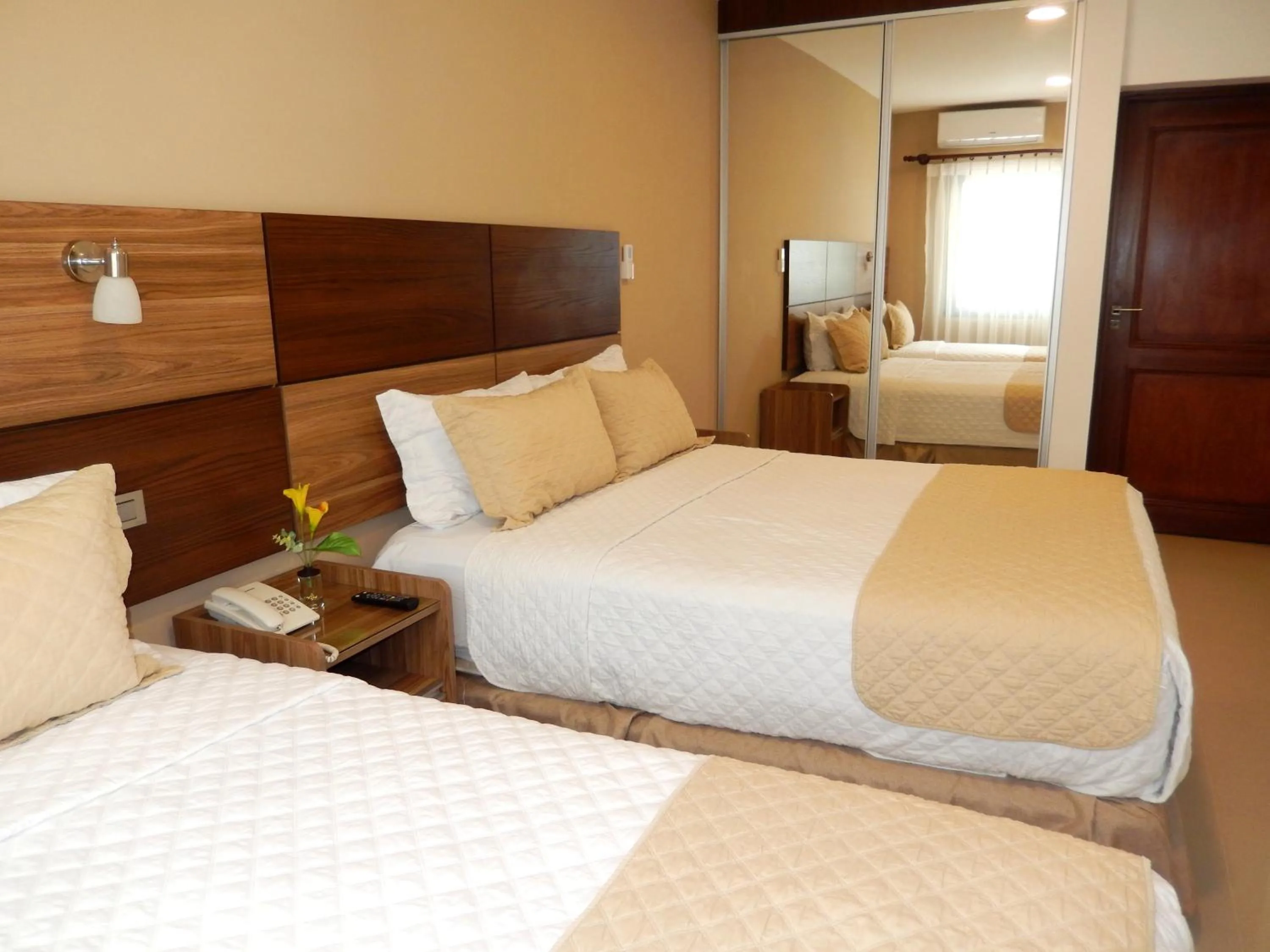 Bed in Premium Suites Deluxe Aparthotel Equipetrol