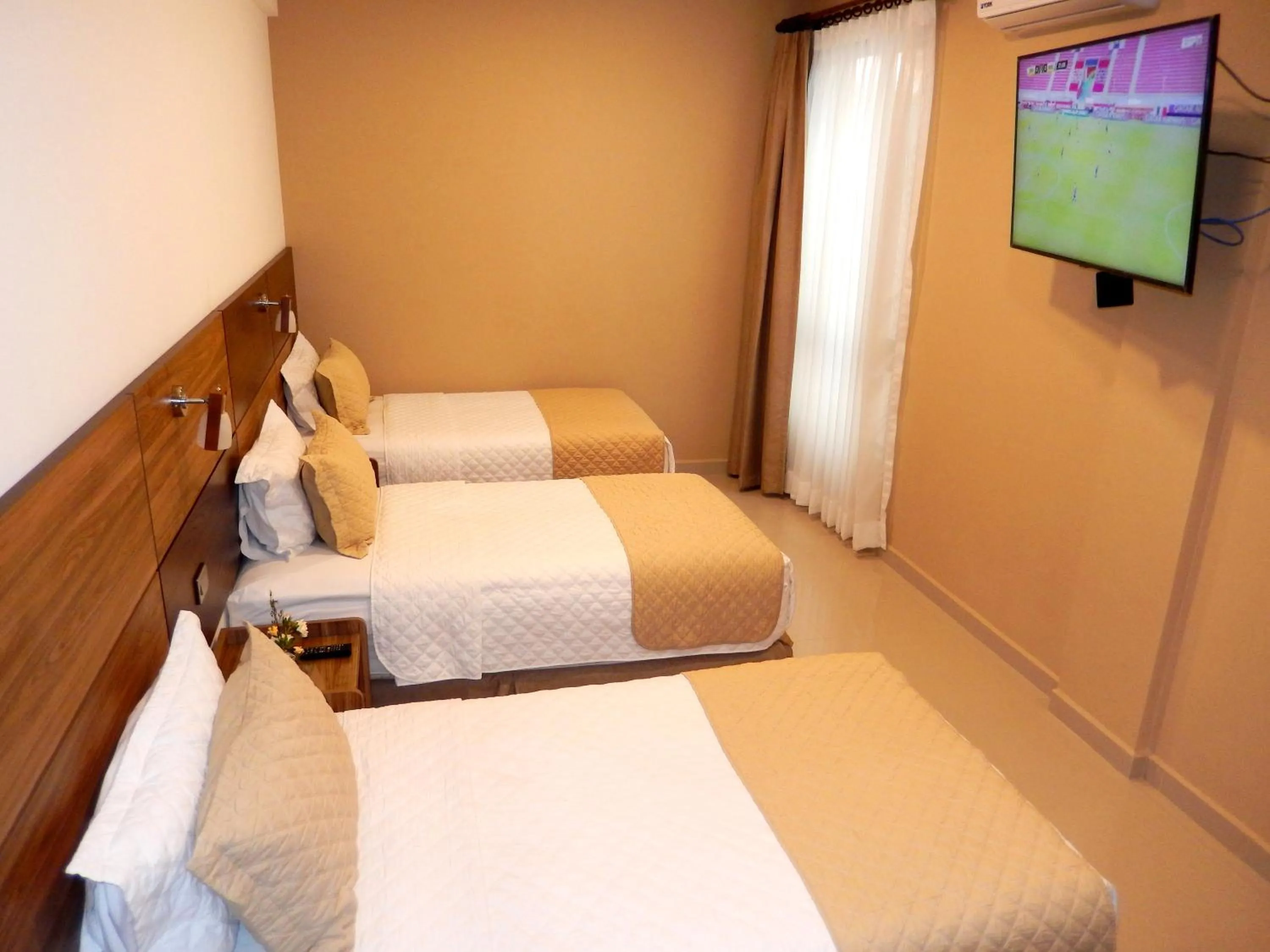 Bed in Premium Suites Deluxe Aparthotel Equipetrol