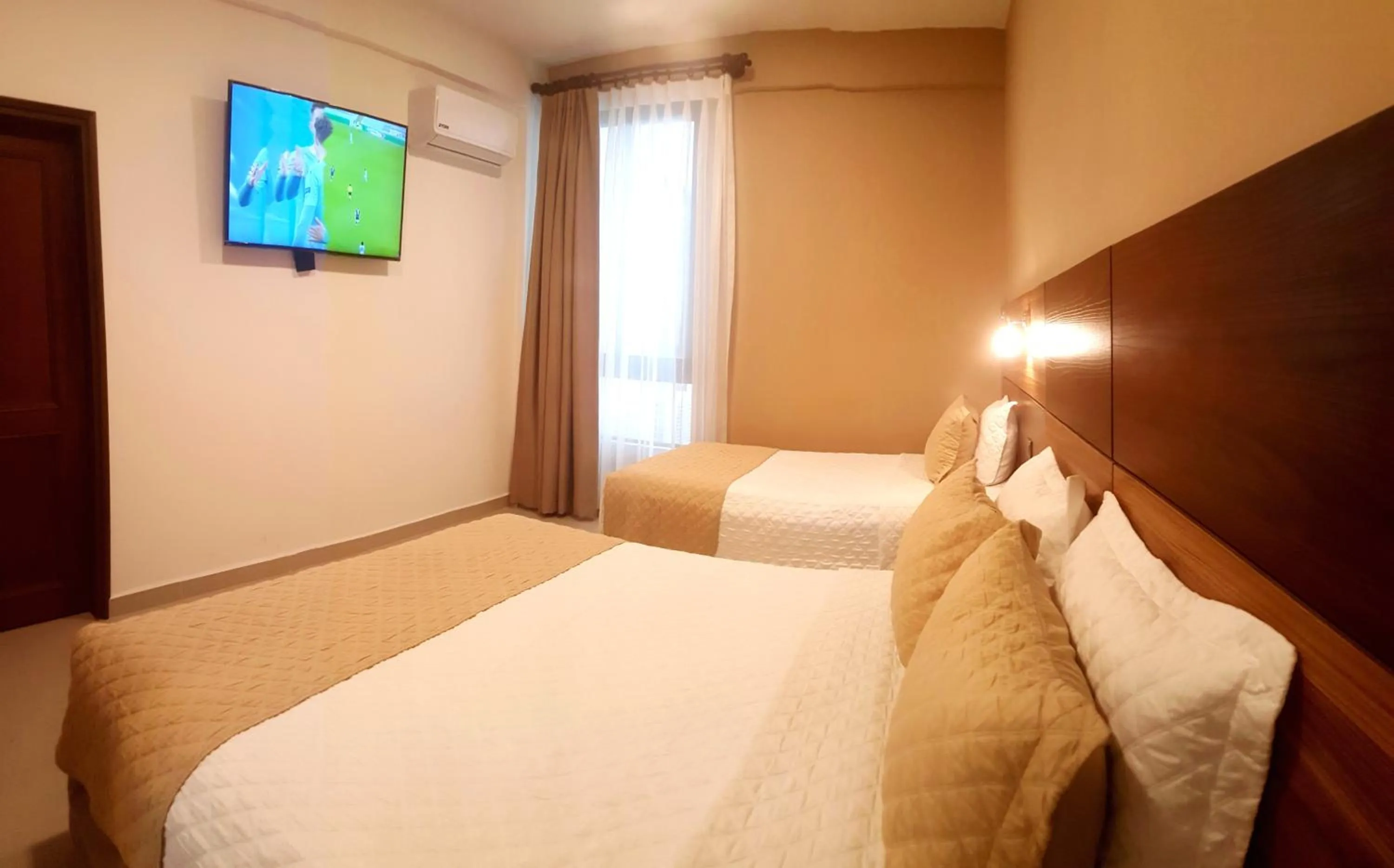 Bed in Premium Suites Deluxe Aparthotel Equipetrol