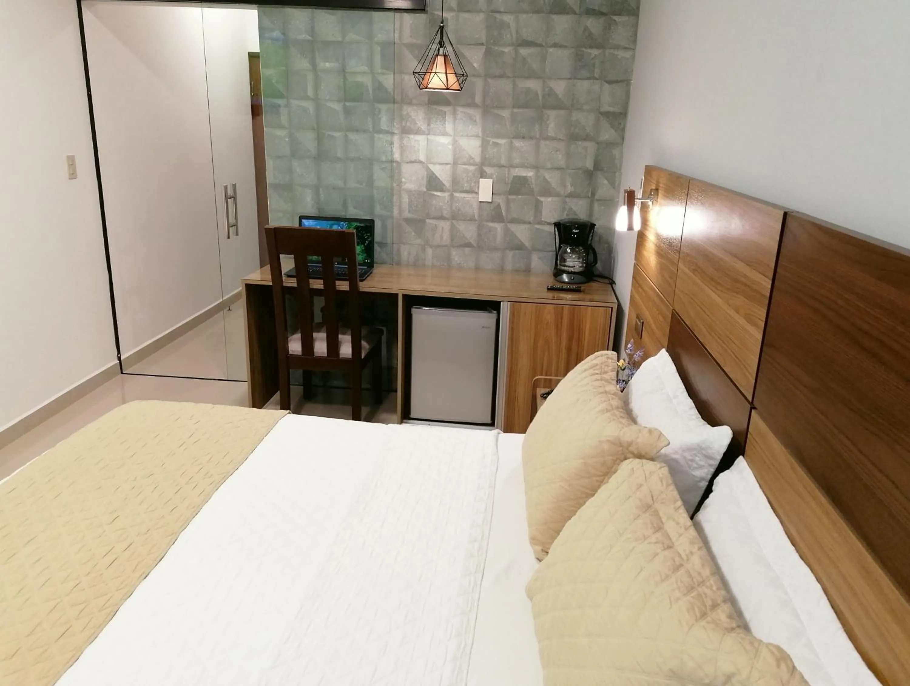 Bed in Premium Suites Deluxe Aparthotel Equipetrol