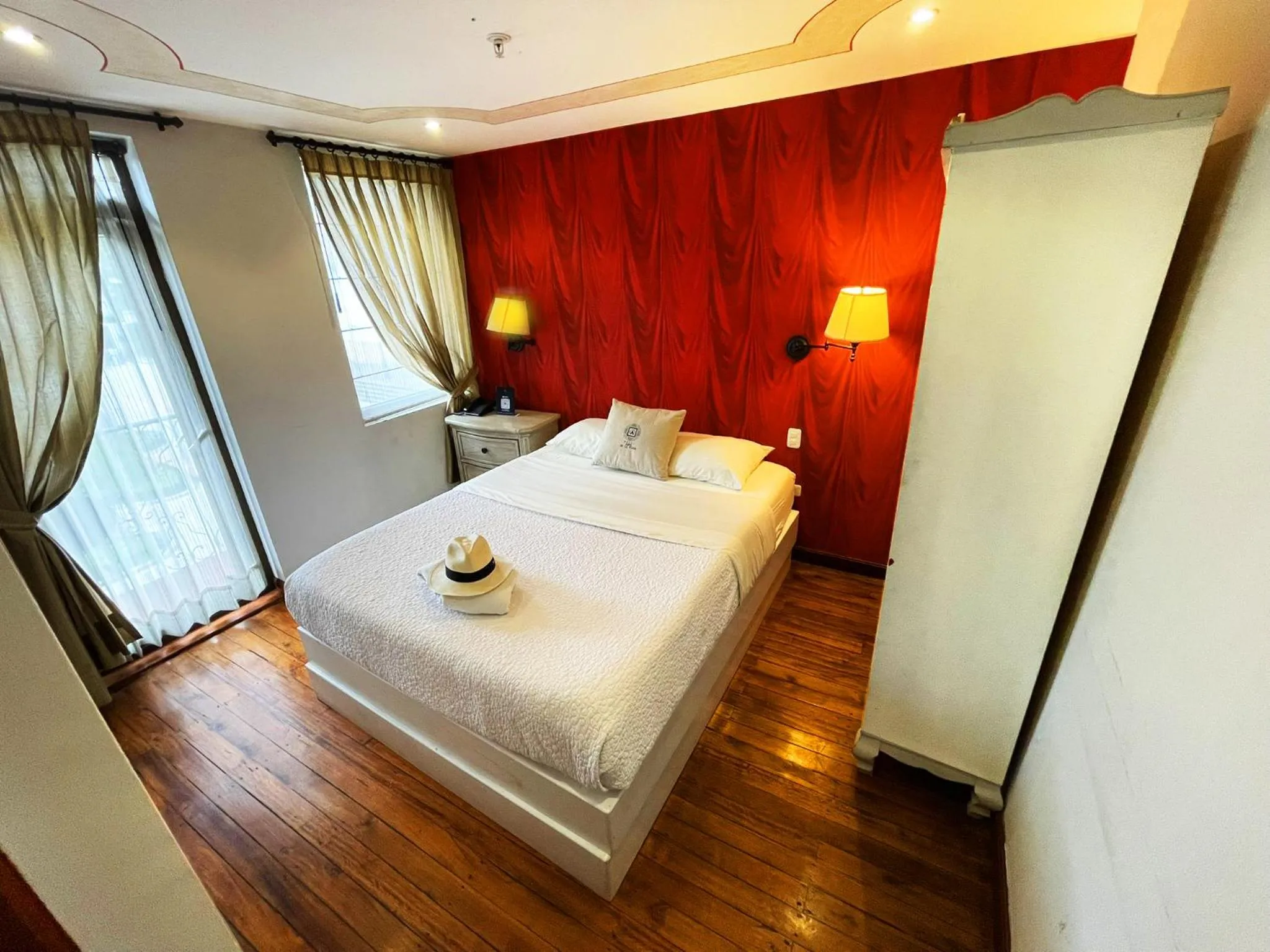 Bed in Hotel Azul de la Plaza by Chat Noir