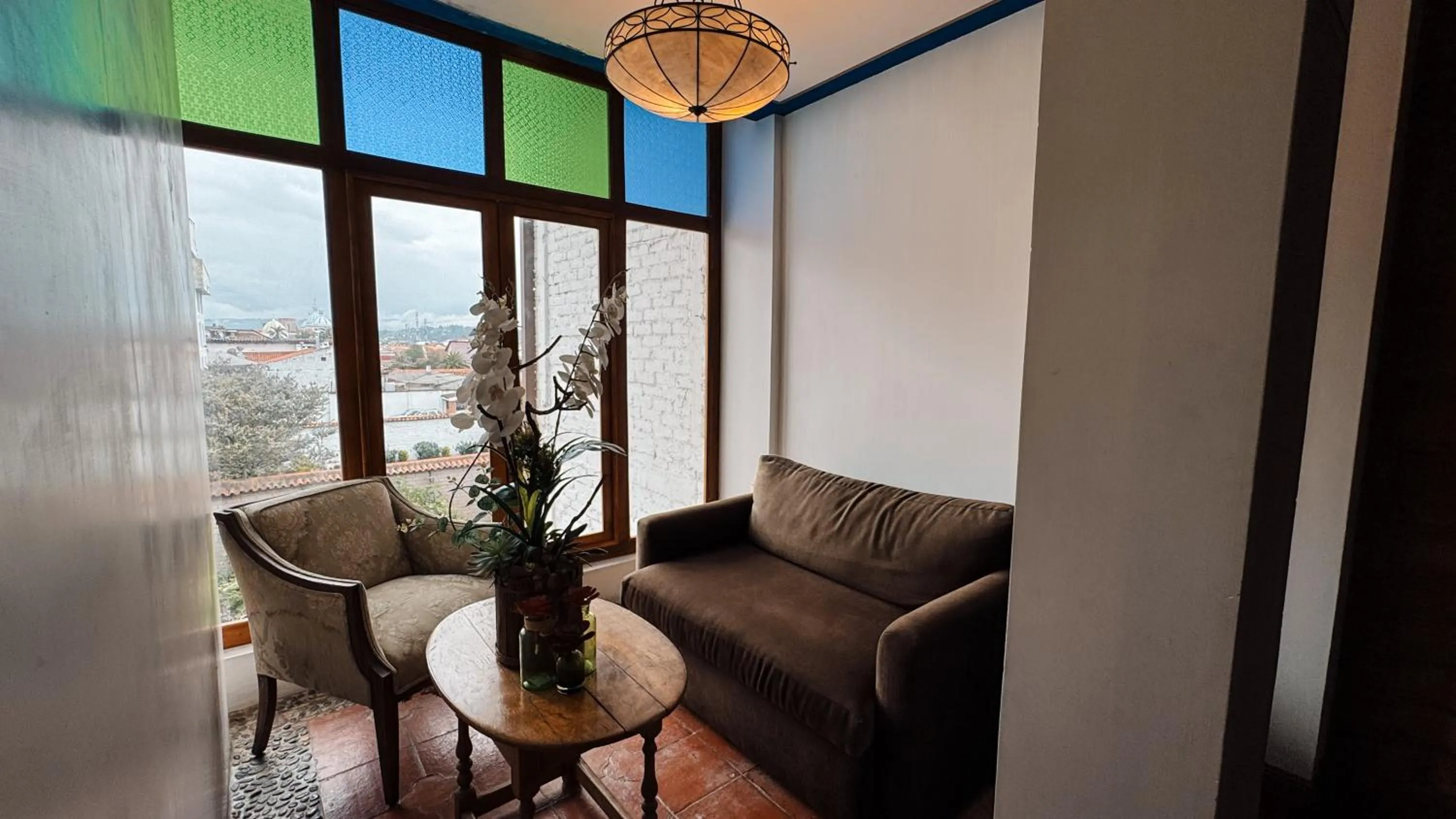 Living room in Hotel Azul de la Plaza by Chat Noir