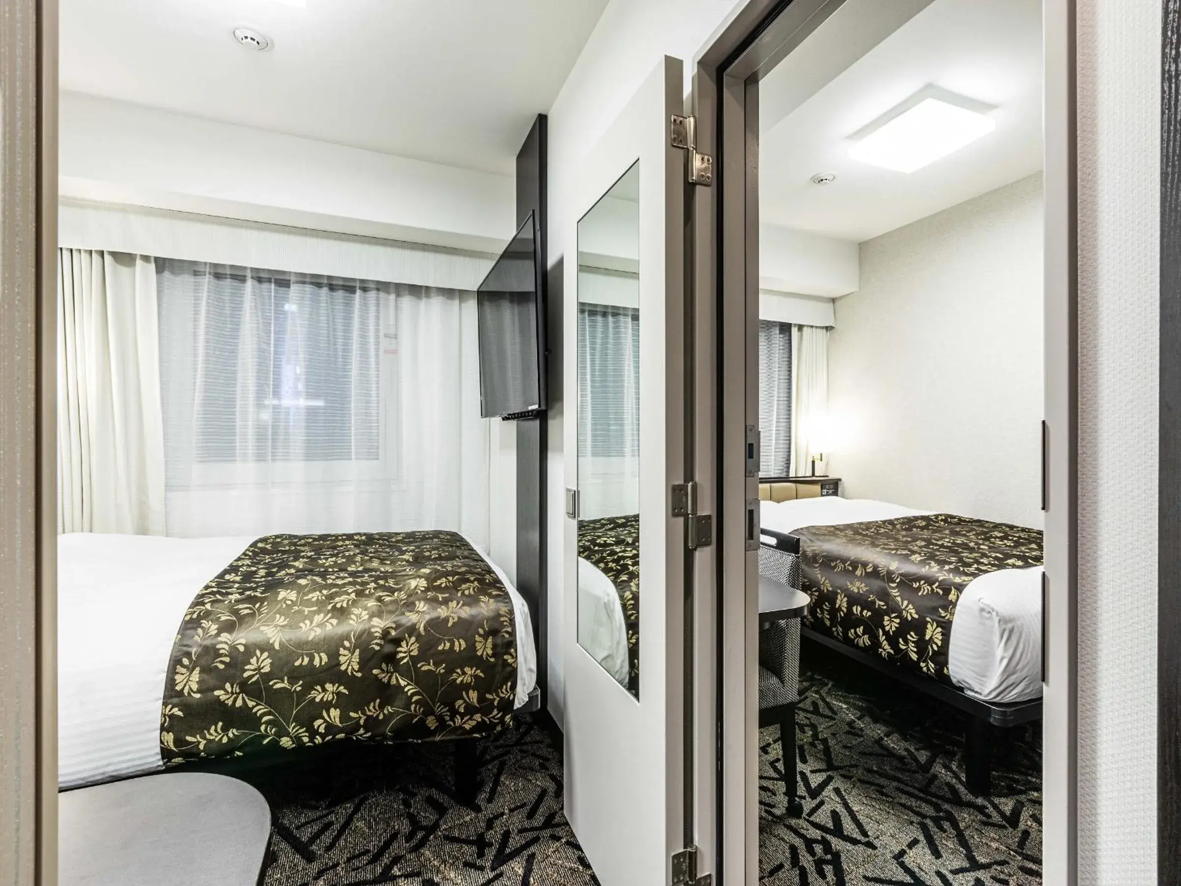 Bed in APA Hotel Nambaminami Ebisucho Eki Shinsekai Bed in APA Hotel Nambaminami Ebisucho Eki Shinsekai