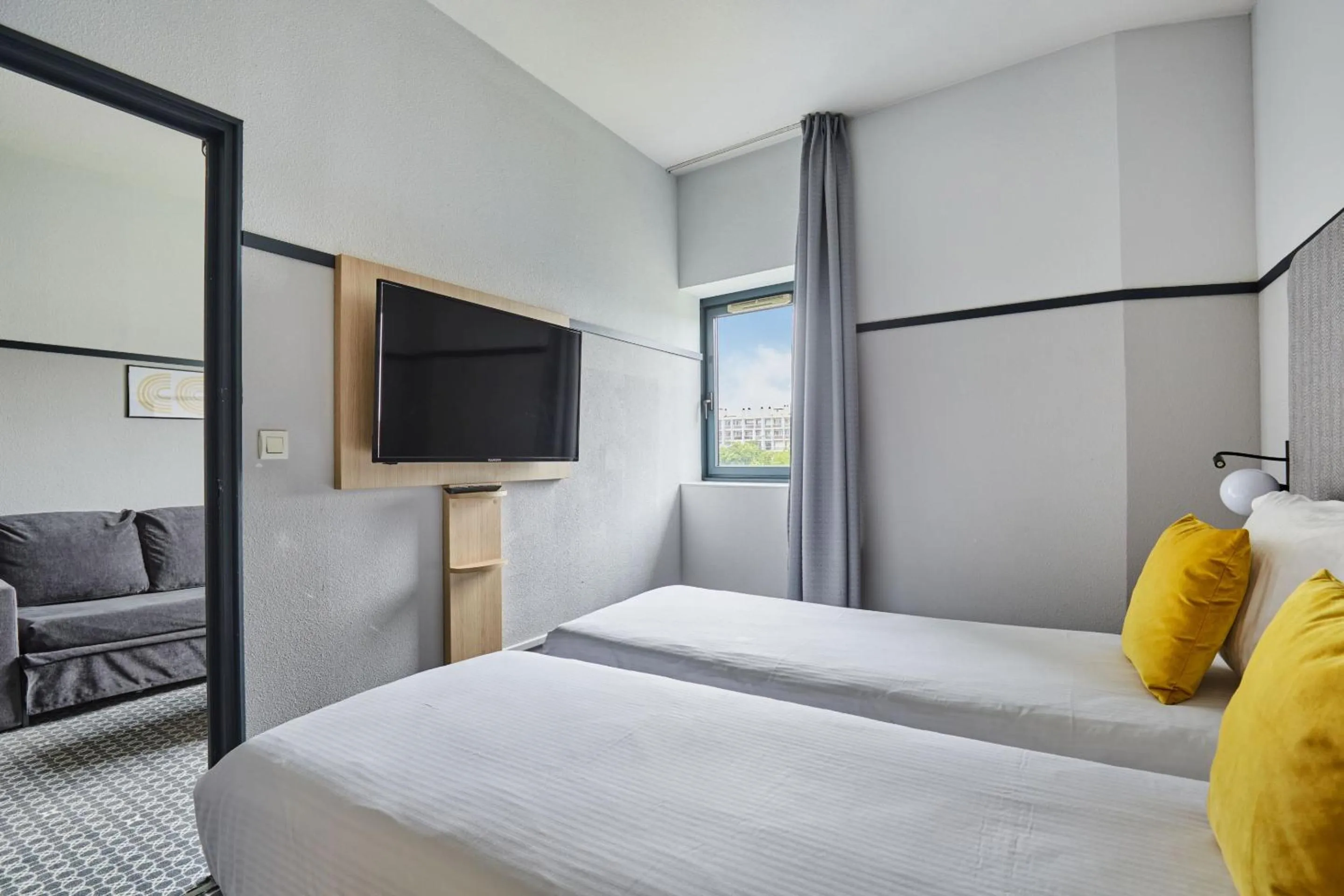 Bed in Appart'hôtel Odalys City - Bioparc Lyon Est