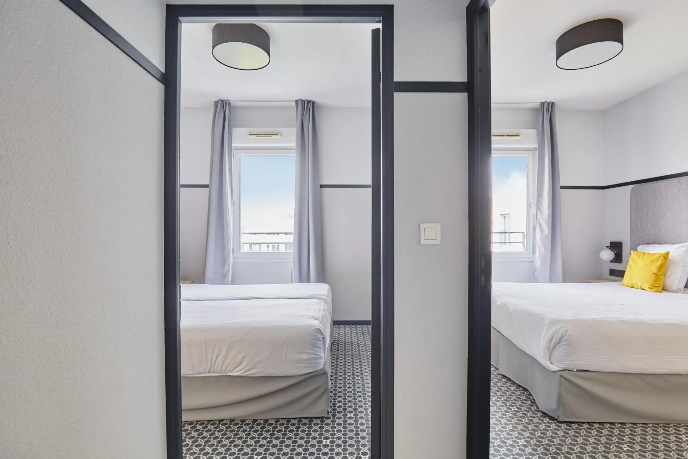 Bedroom, Bed in Appart'hôtel Odalys City - Bioparc Lyon Est