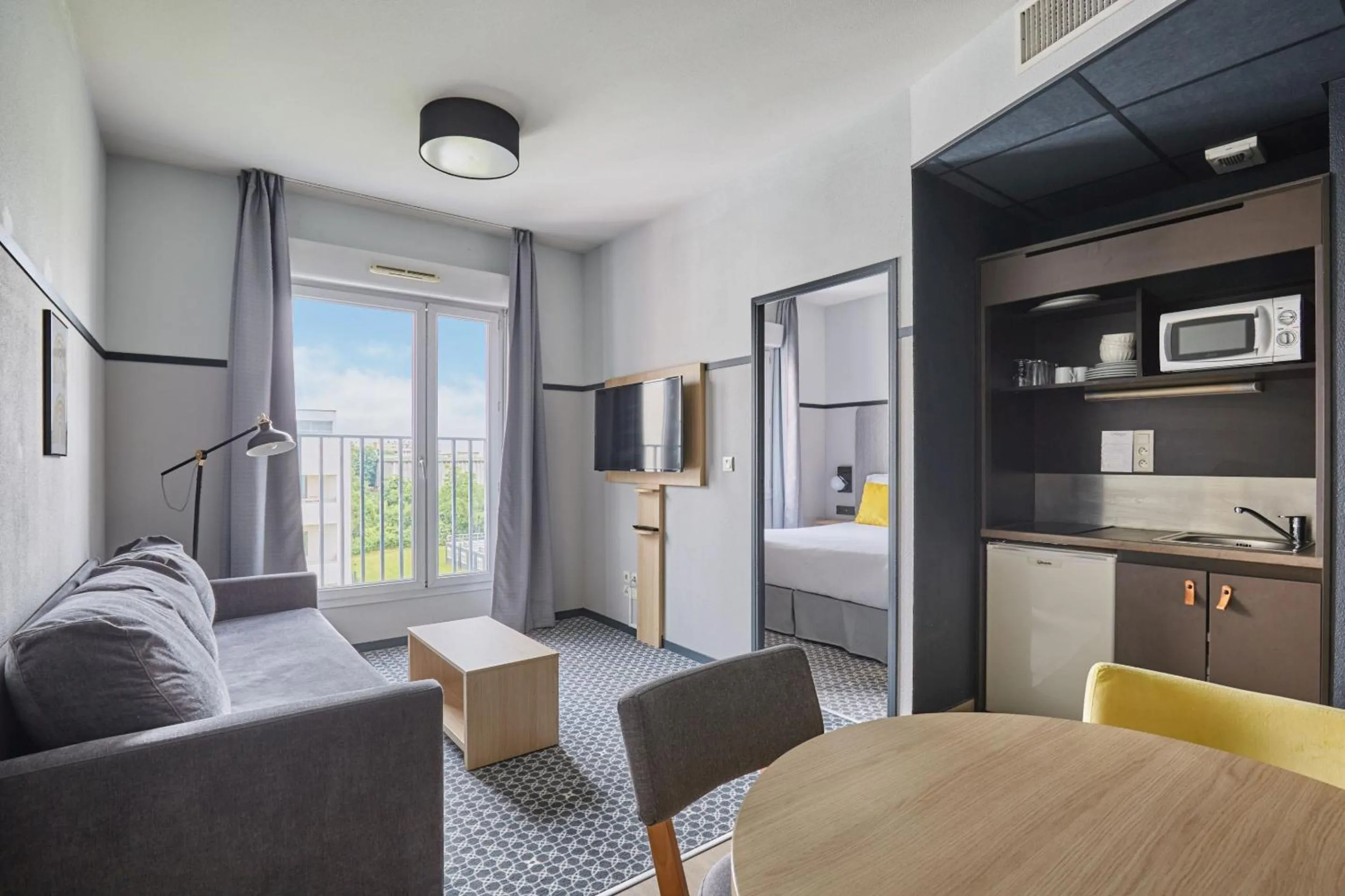 TV and multimedia, Bed in Appart'hôtel Odalys City - Bioparc Lyon Est