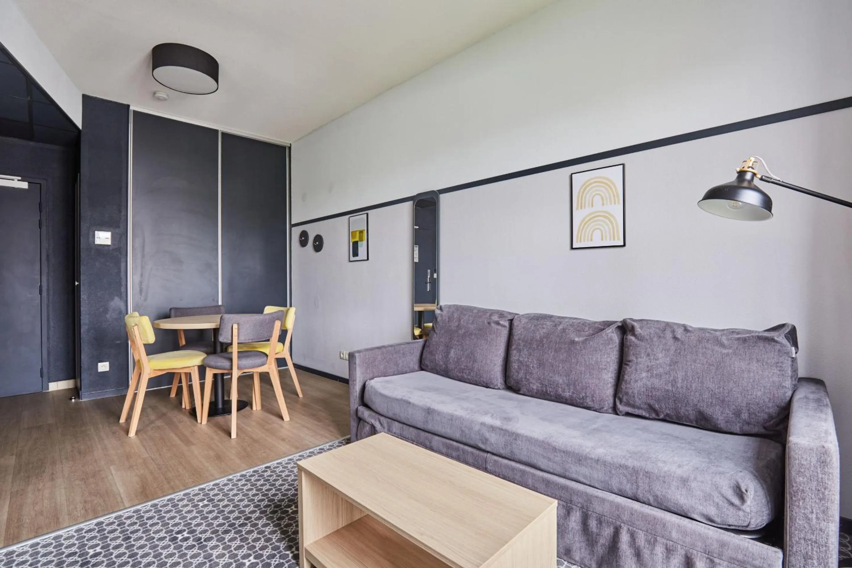 Living room in Appart'hôtel Odalys City - Bioparc Lyon Est