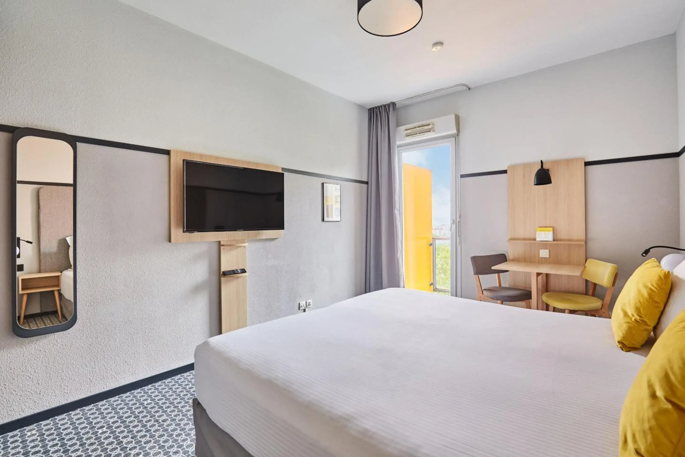 Bed in Appart'hôtel Odalys City - Bioparc Lyon Est Bed in Appart'hôtel Odalys City - Bioparc Lyon Est