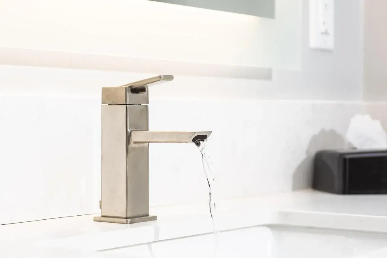 Bathroom in Palm Garden Hotel Bathroom in Palm Garden Hotel