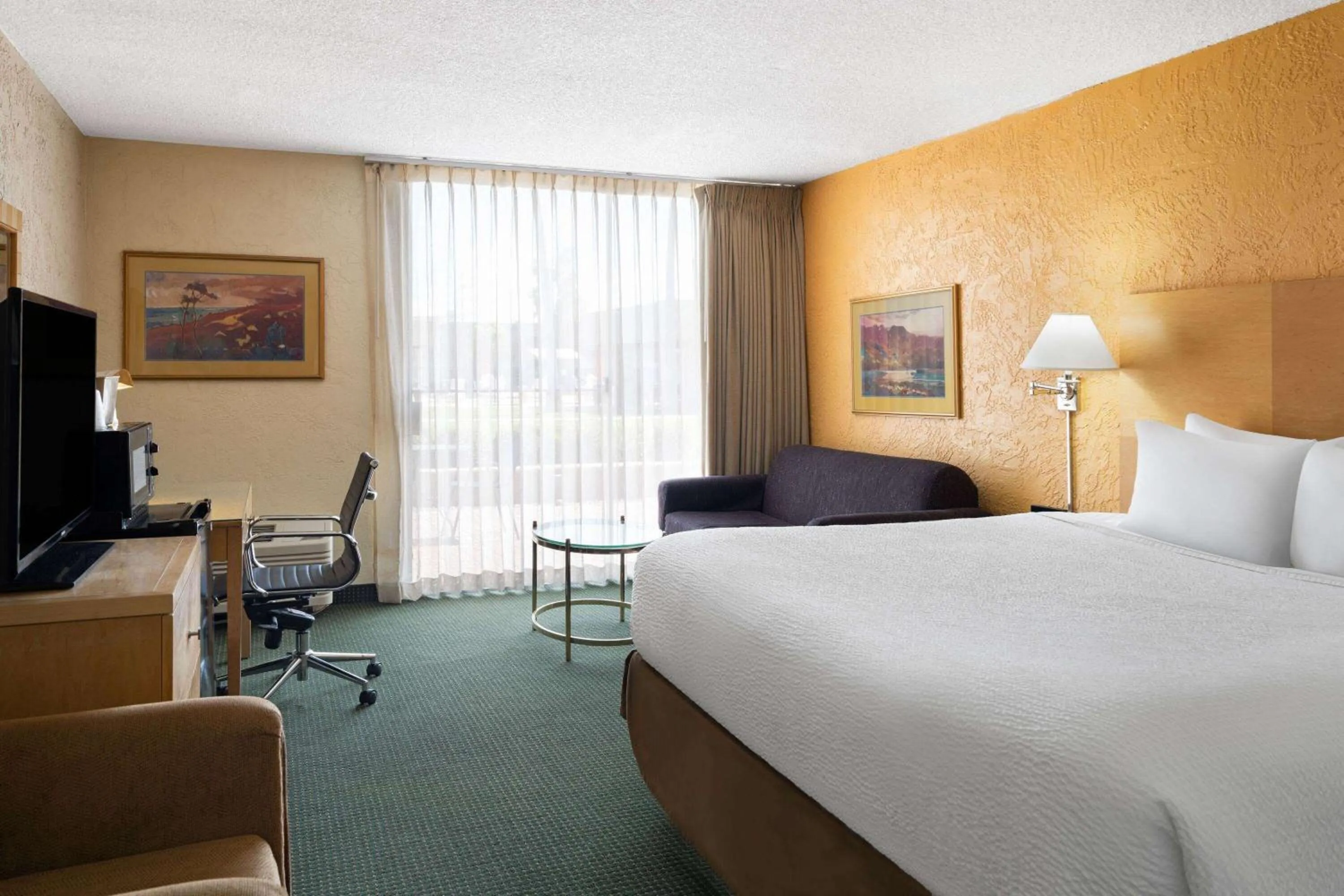 Photo of the whole room, Bed in Ramada by Wyndham Tucson