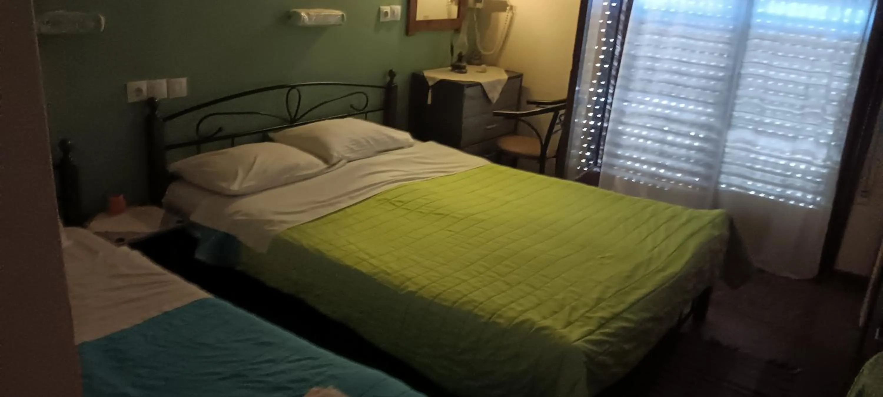 Bed in Hotel zakros rooms-restaurant