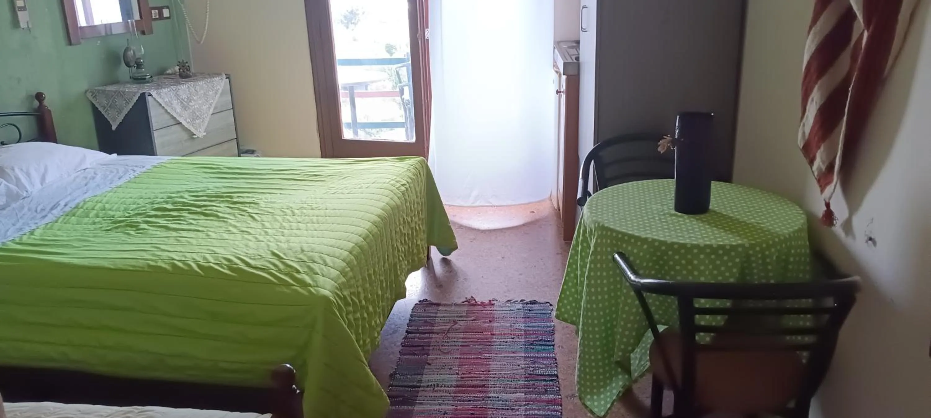 Bed in Hotel zakros rooms-restaurant