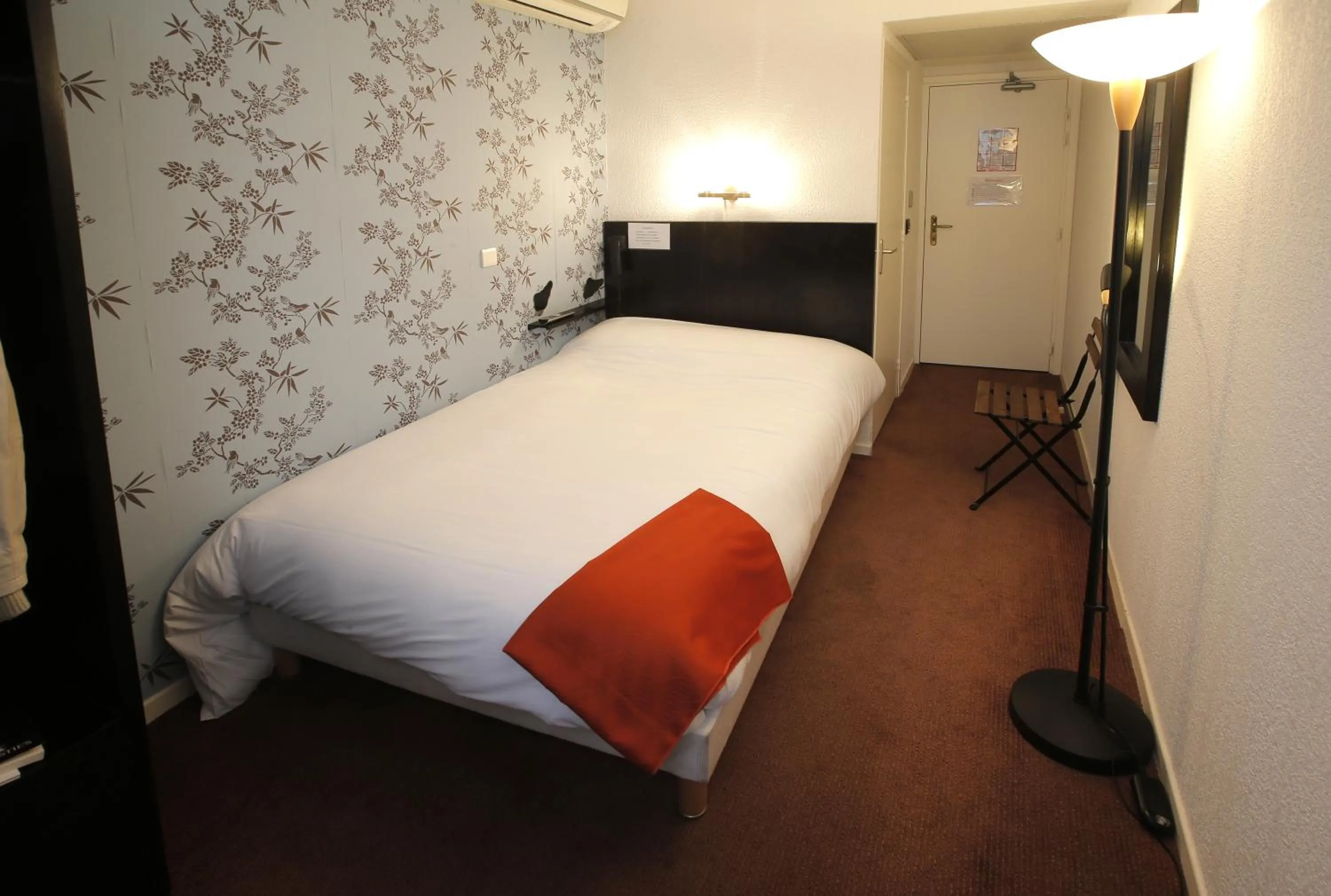 Bed in Hôtel Alizé