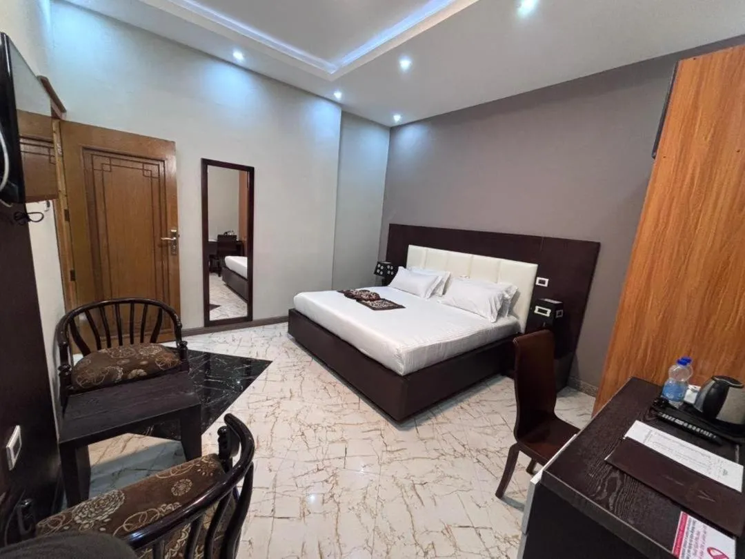 Bed in Afro legacy hotel