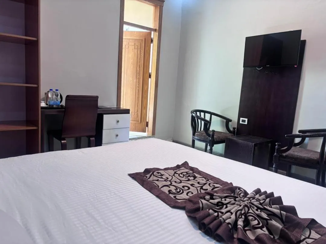 Bed in Afro legacy hotel