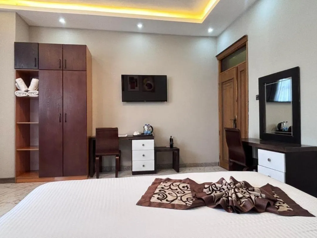 Bed in Afro legacy hotel