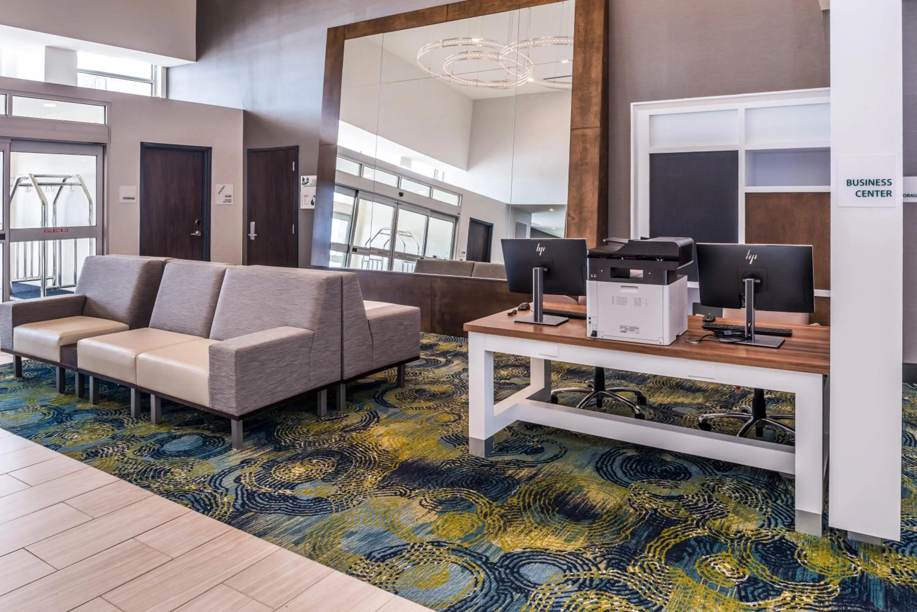 Communal lounge/ TV room in Holiday Inn Detroit Northwest - Livonia by IHG