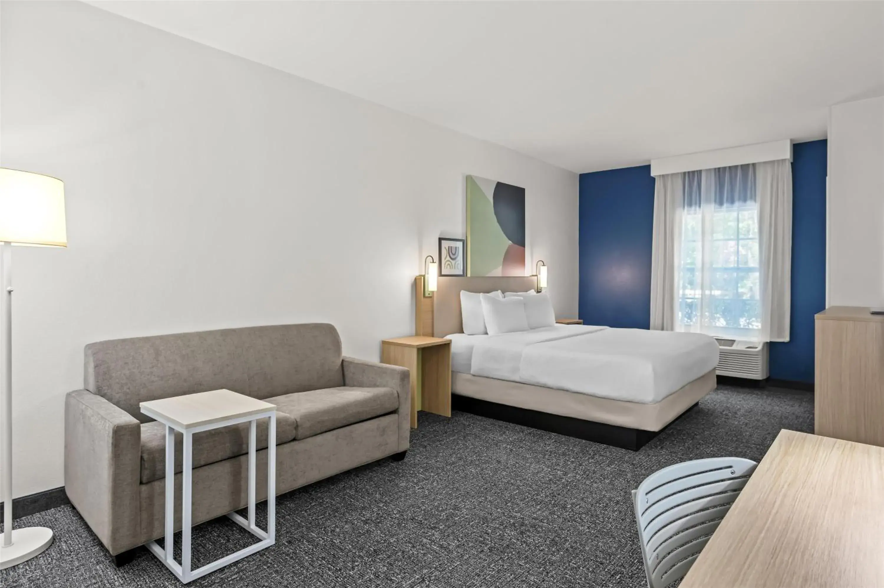 Living room, Bed in Spark by Hilton Bluffton Hilton Head Island Living room, Bed in Spark by Hilton Bluffton Hilton Head Island