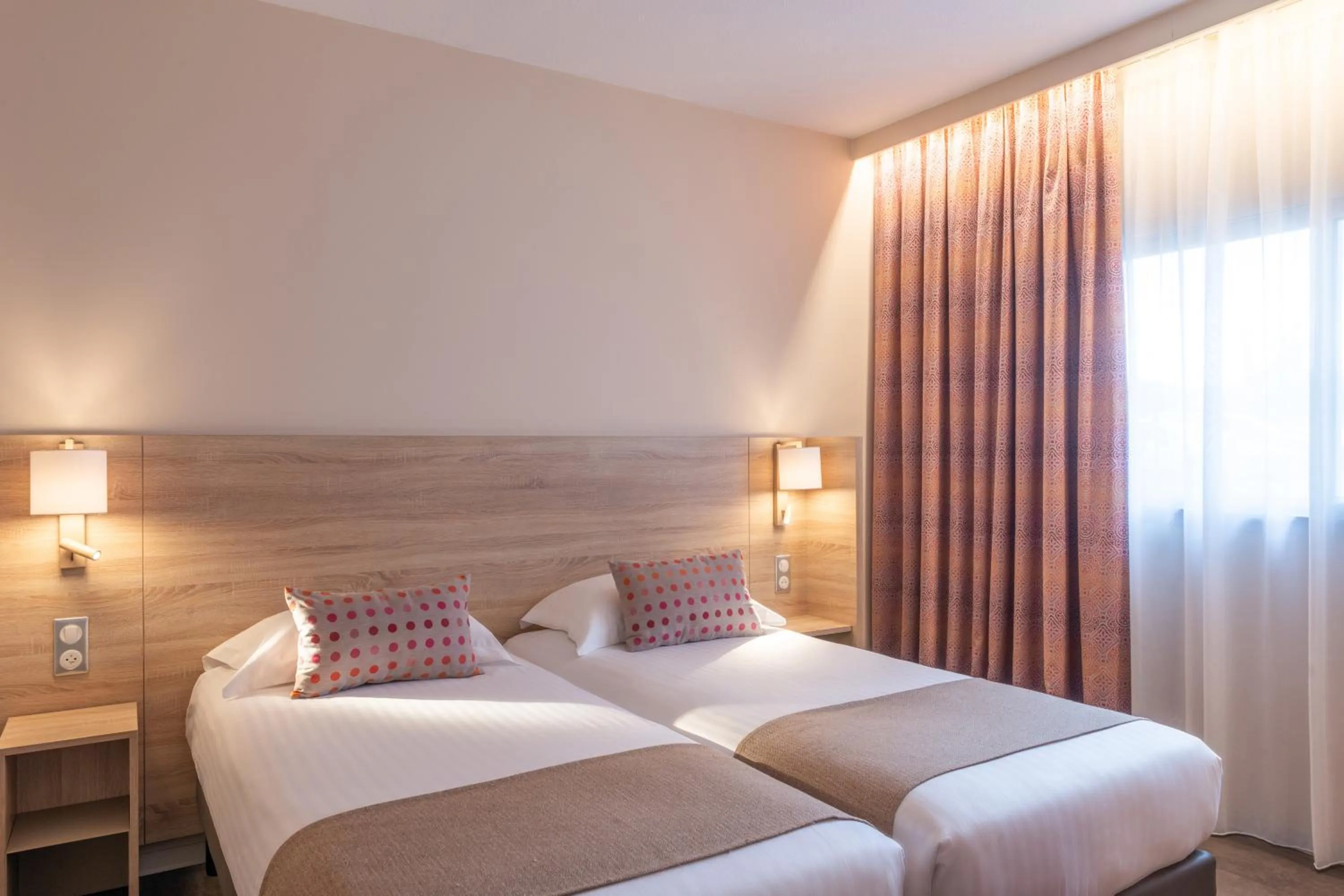 Bed in Hôtel L'Empreinte