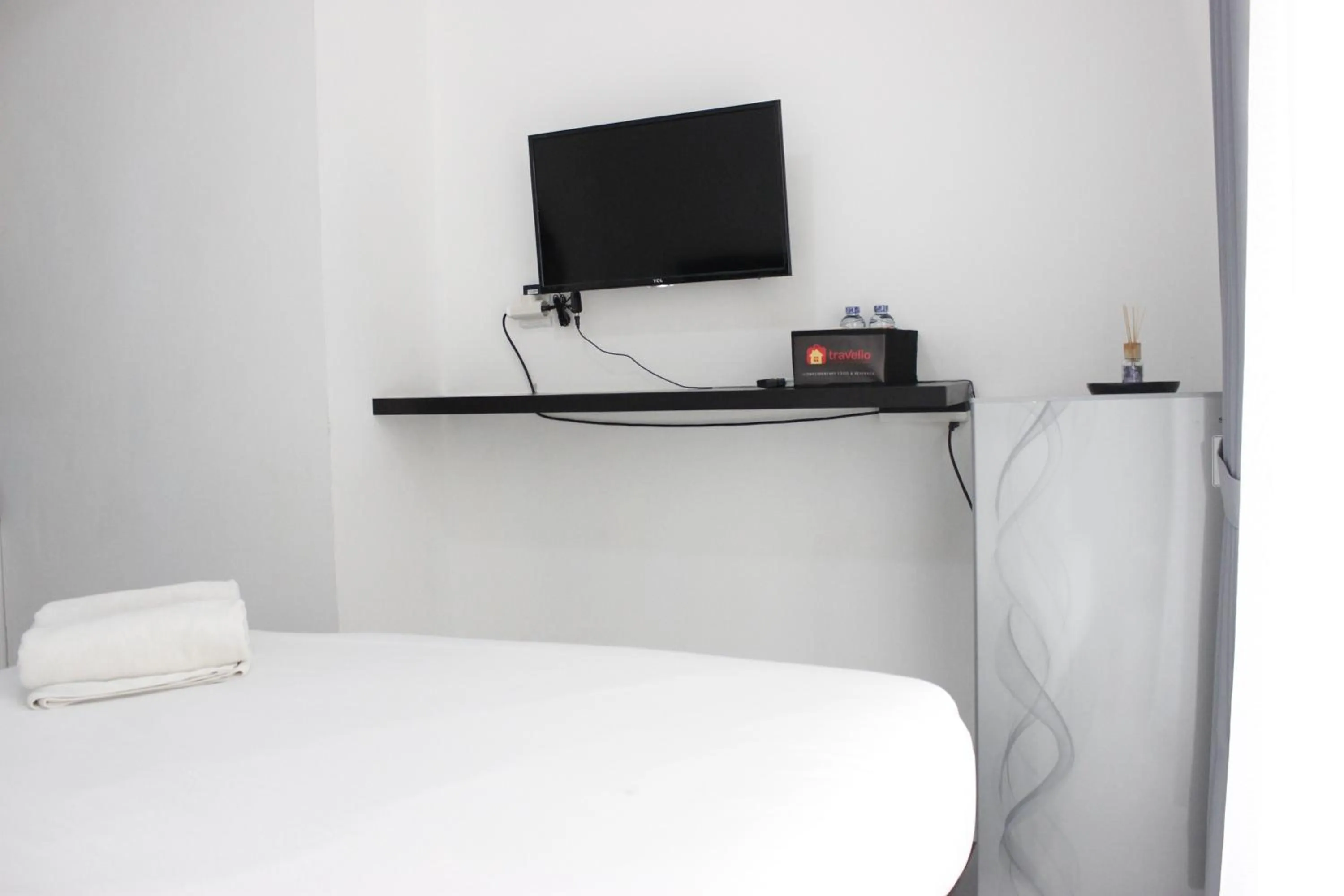 Bed in Monochrome Style Studio Room @Grand Asia Afrika Apartment By Travelio