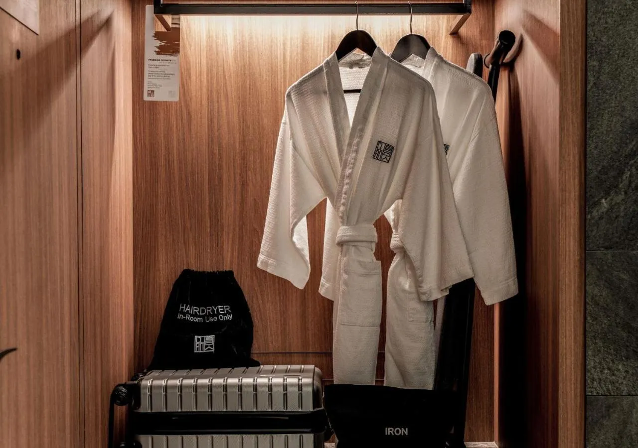 wardrobe in The Clan Hotel Singapore by Far East Hospitality