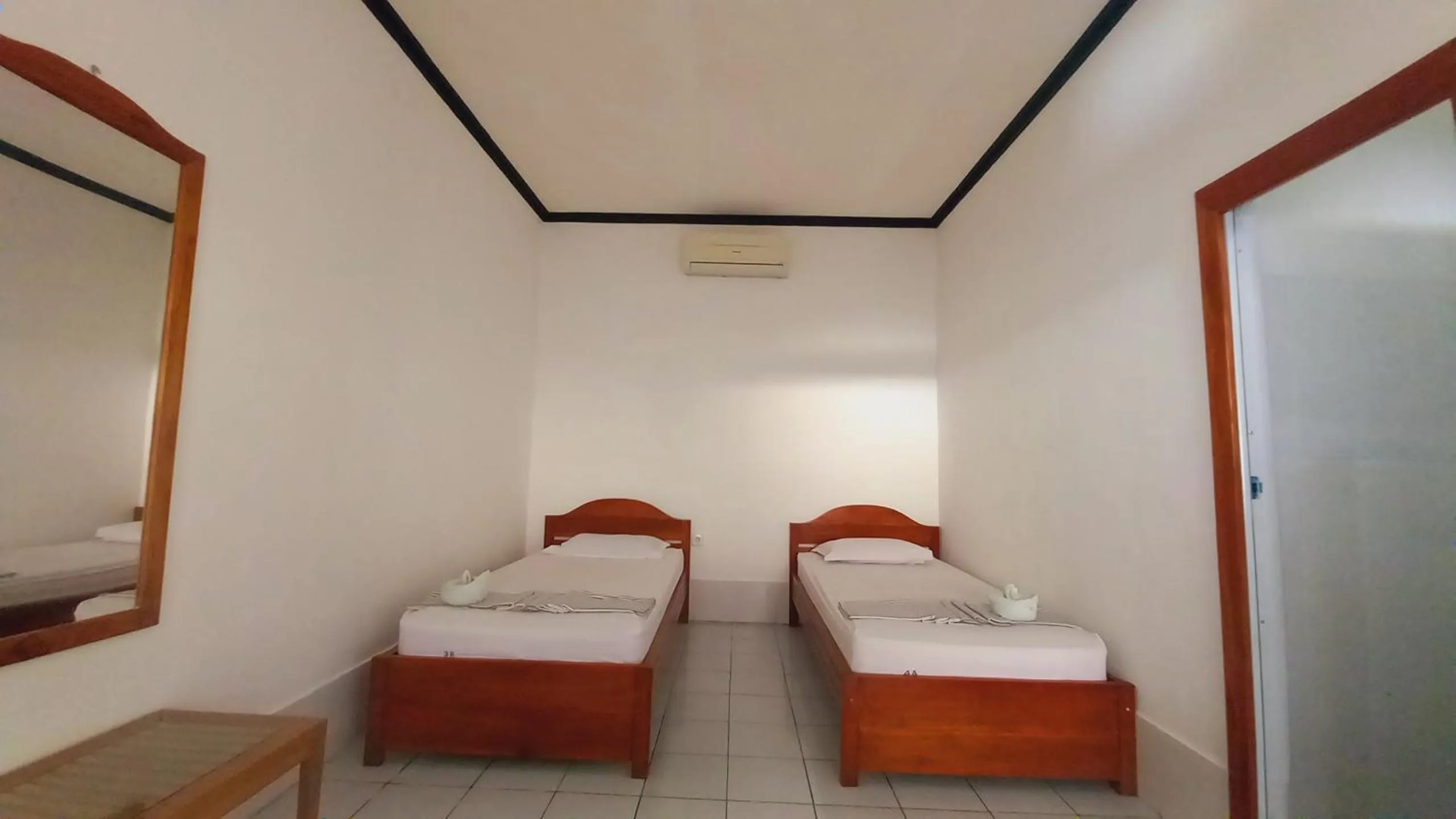 Bed in Bajo Hotel
