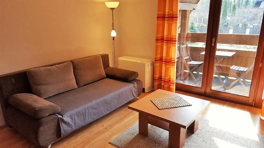 Communal lounge/ TV room in Apartament Giewont