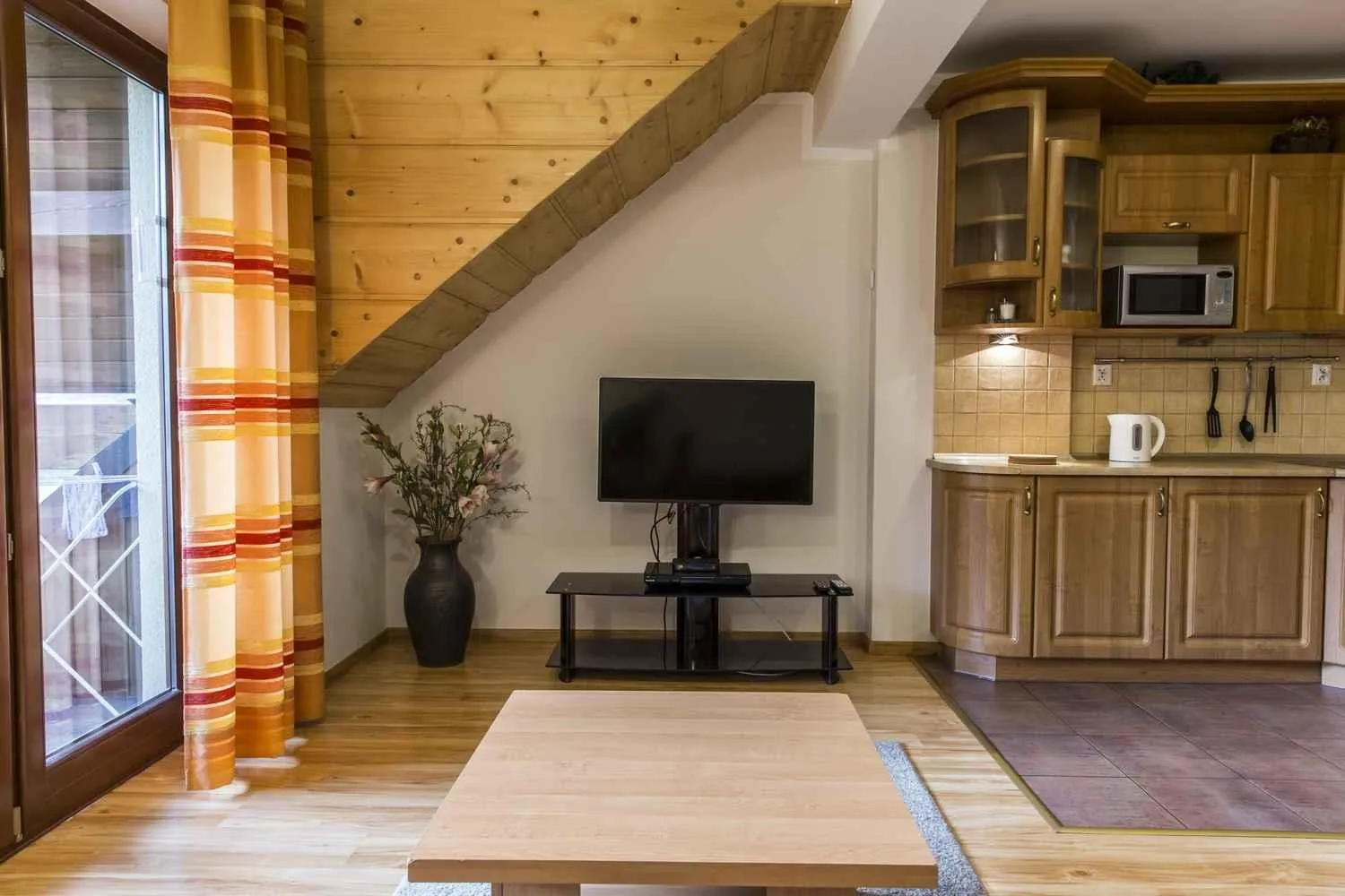 Communal lounge/ TV room in Apartament Giewont