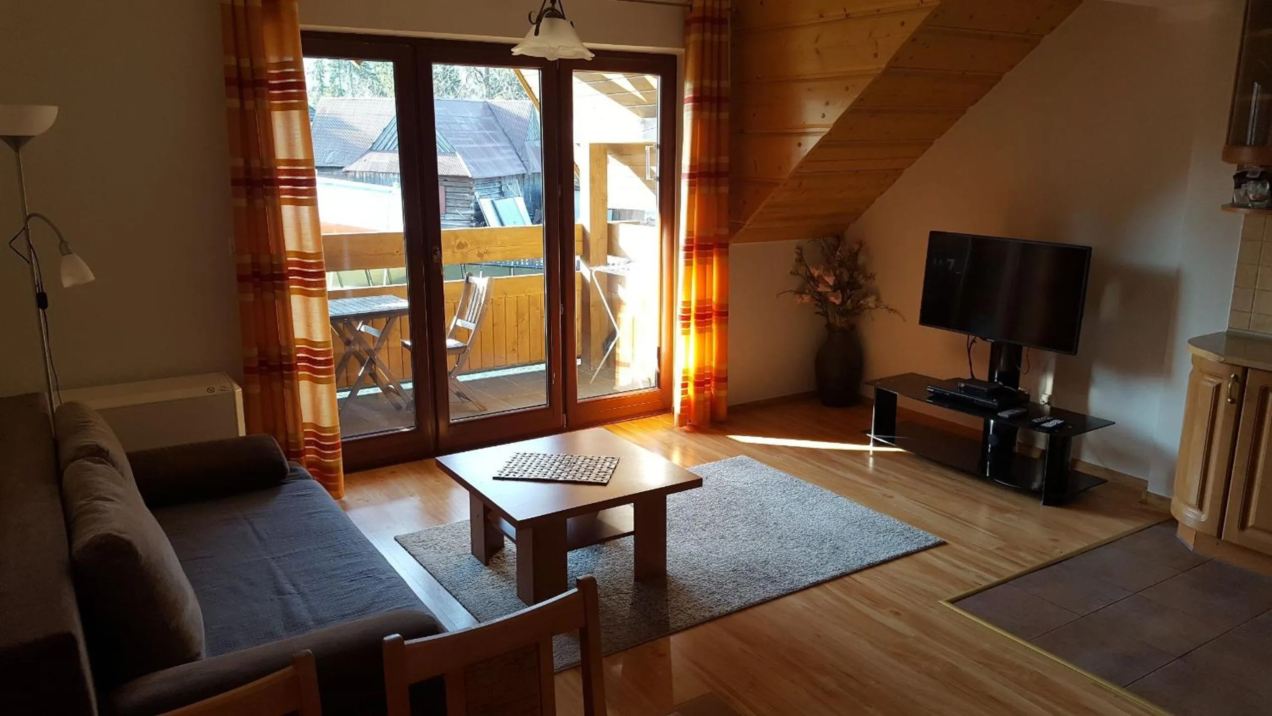 Communal lounge/ TV room in Apartament Giewont