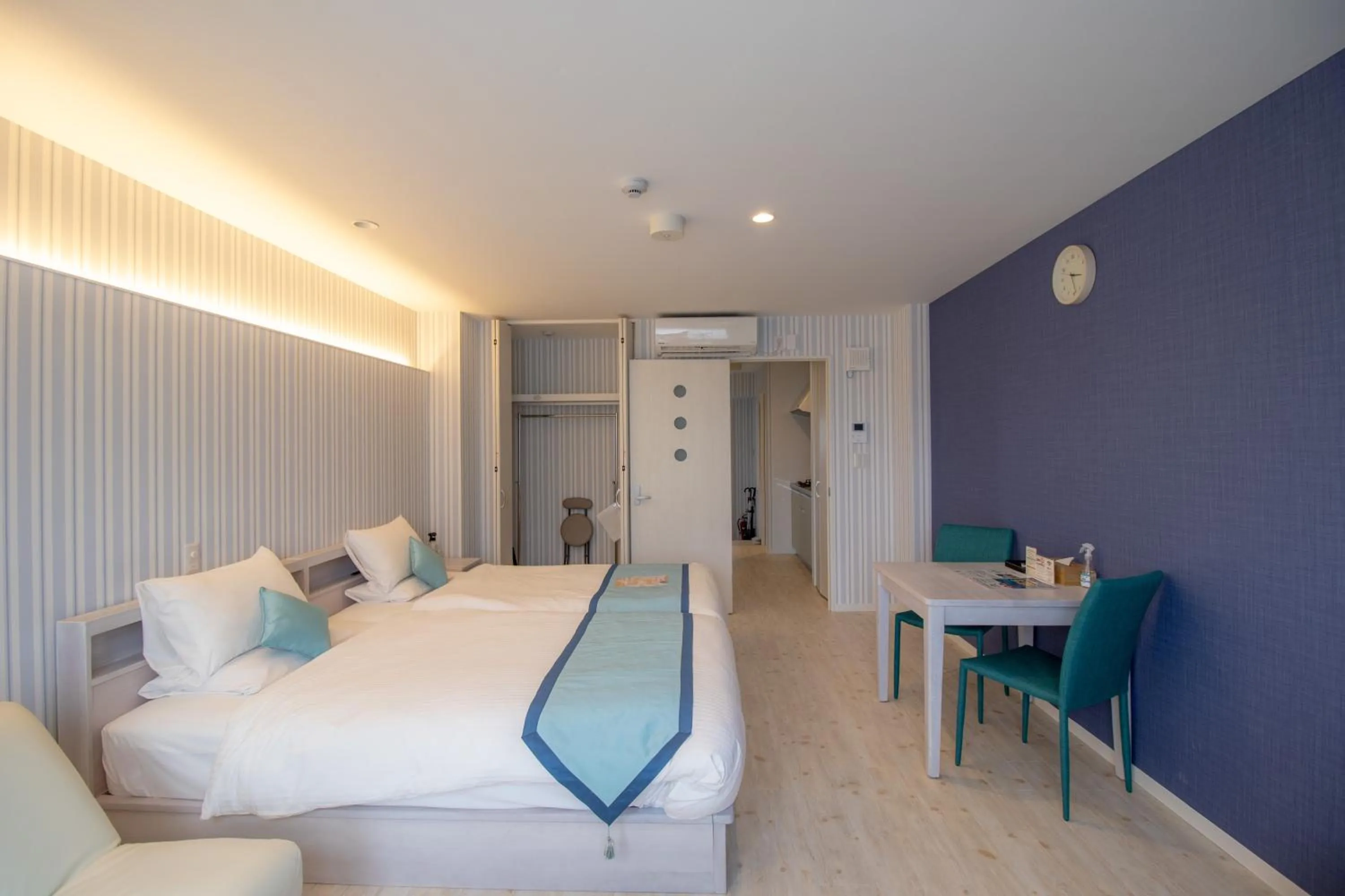 Bed in Pine Hills Hotel Miyakojima