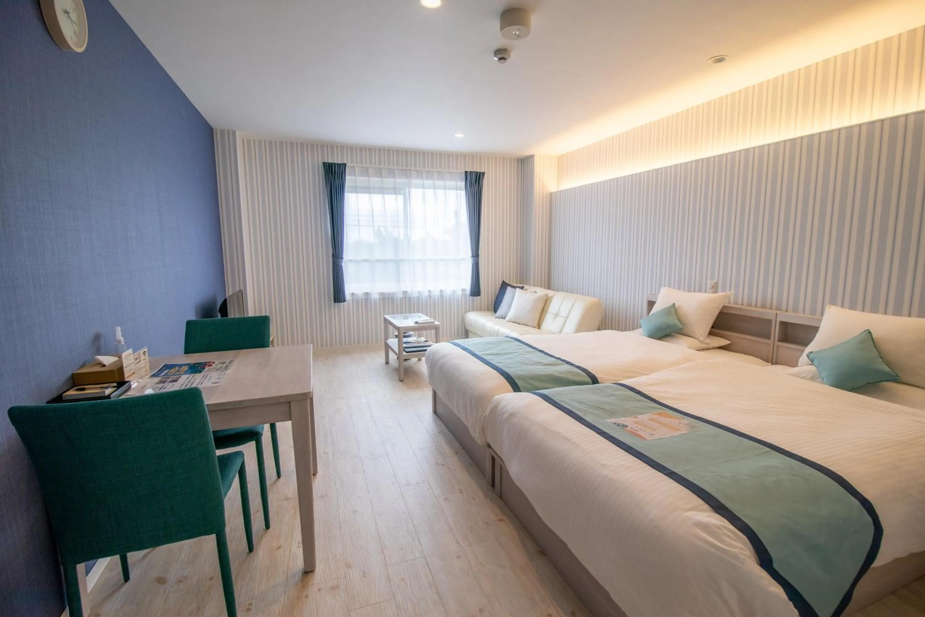 Photo of the whole room, Bed in Pine Hills Hotel Miyakojima