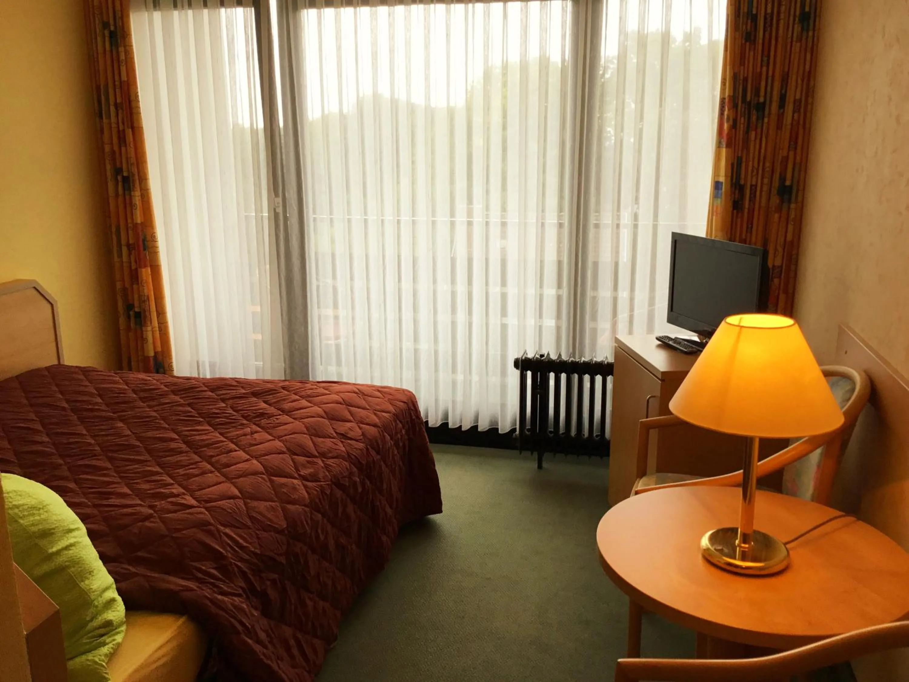 Photo of the whole room, Bed in Panorama Hotel Pension Frohnau