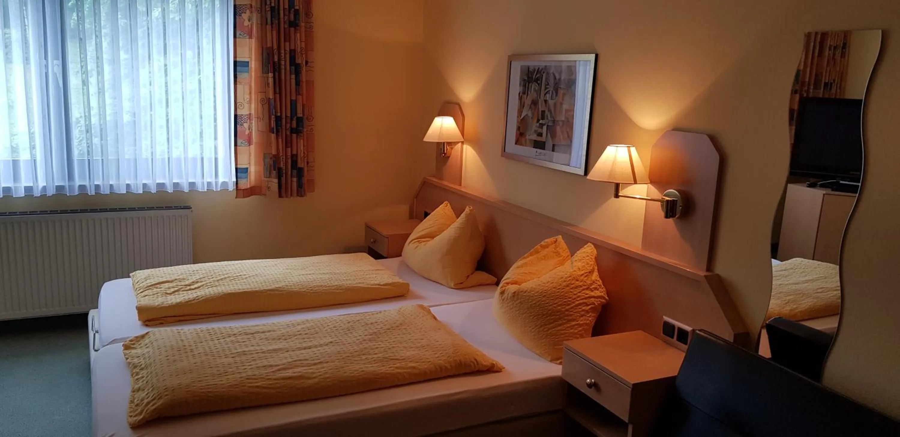 Photo of the whole room, Bed in Panorama Hotel Pension Frohnau