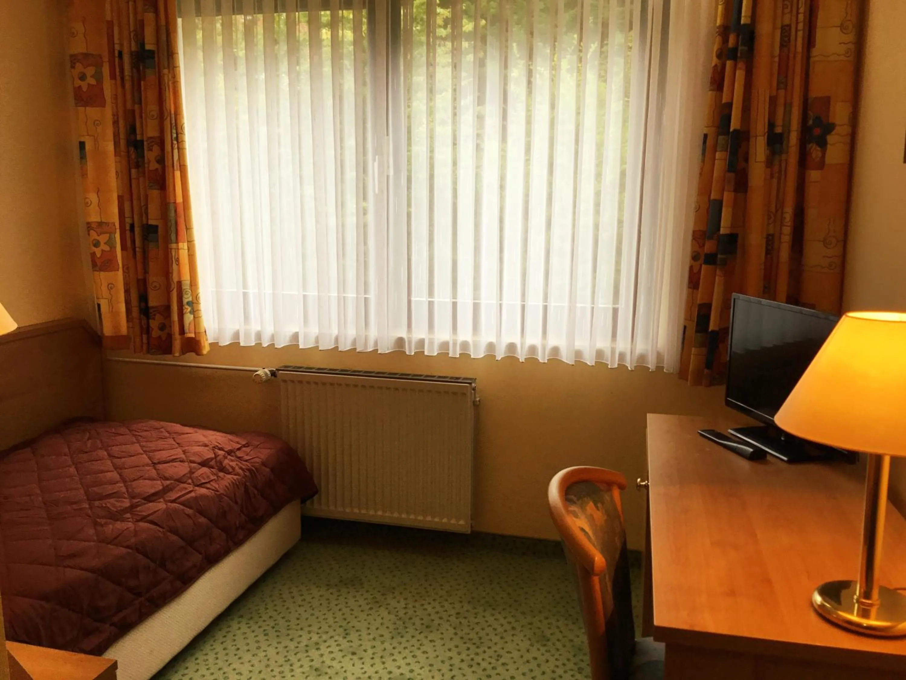 Photo of the whole room, Bed in Panorama Hotel Pension Frohnau