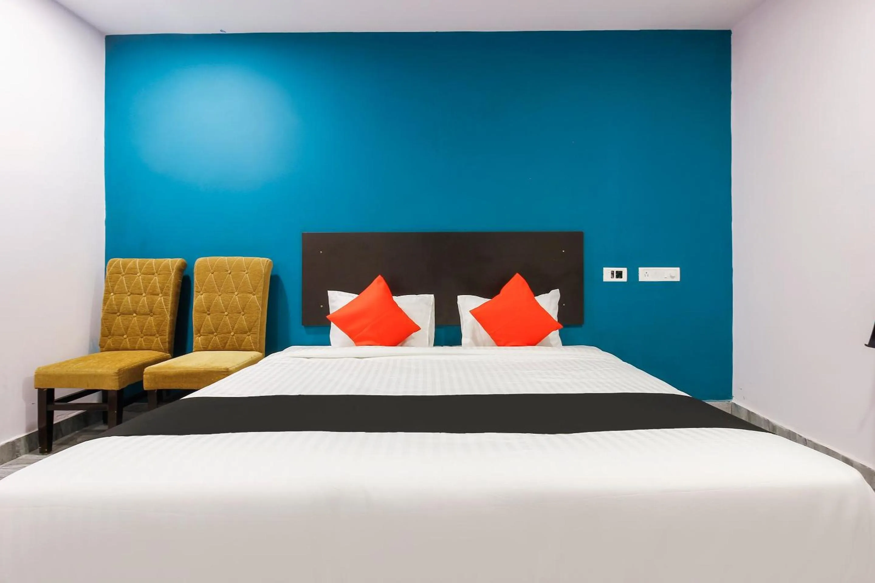 Bedroom, Bed in Capital O Che Sigma Hotel