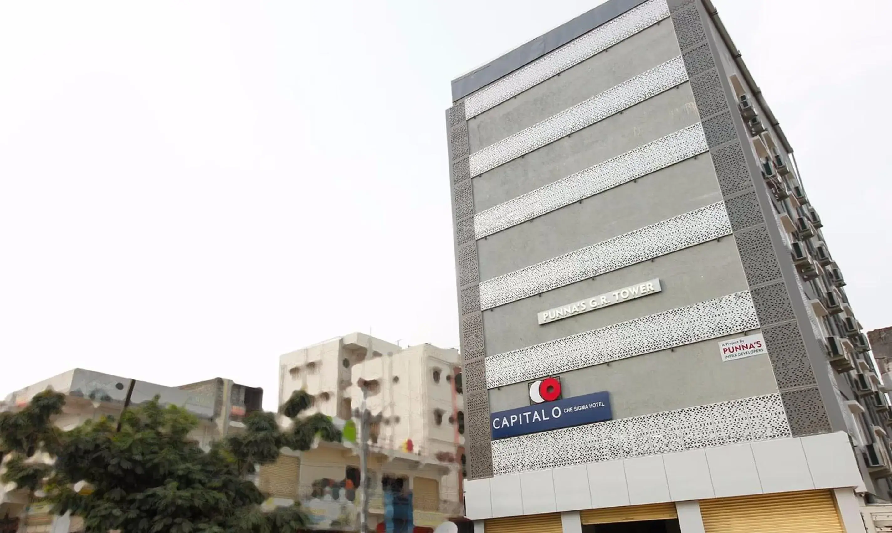 Facade/entrance in Capital O Che Sigma Hotel Facade/entrance in Capital O Che Sigma Hotel