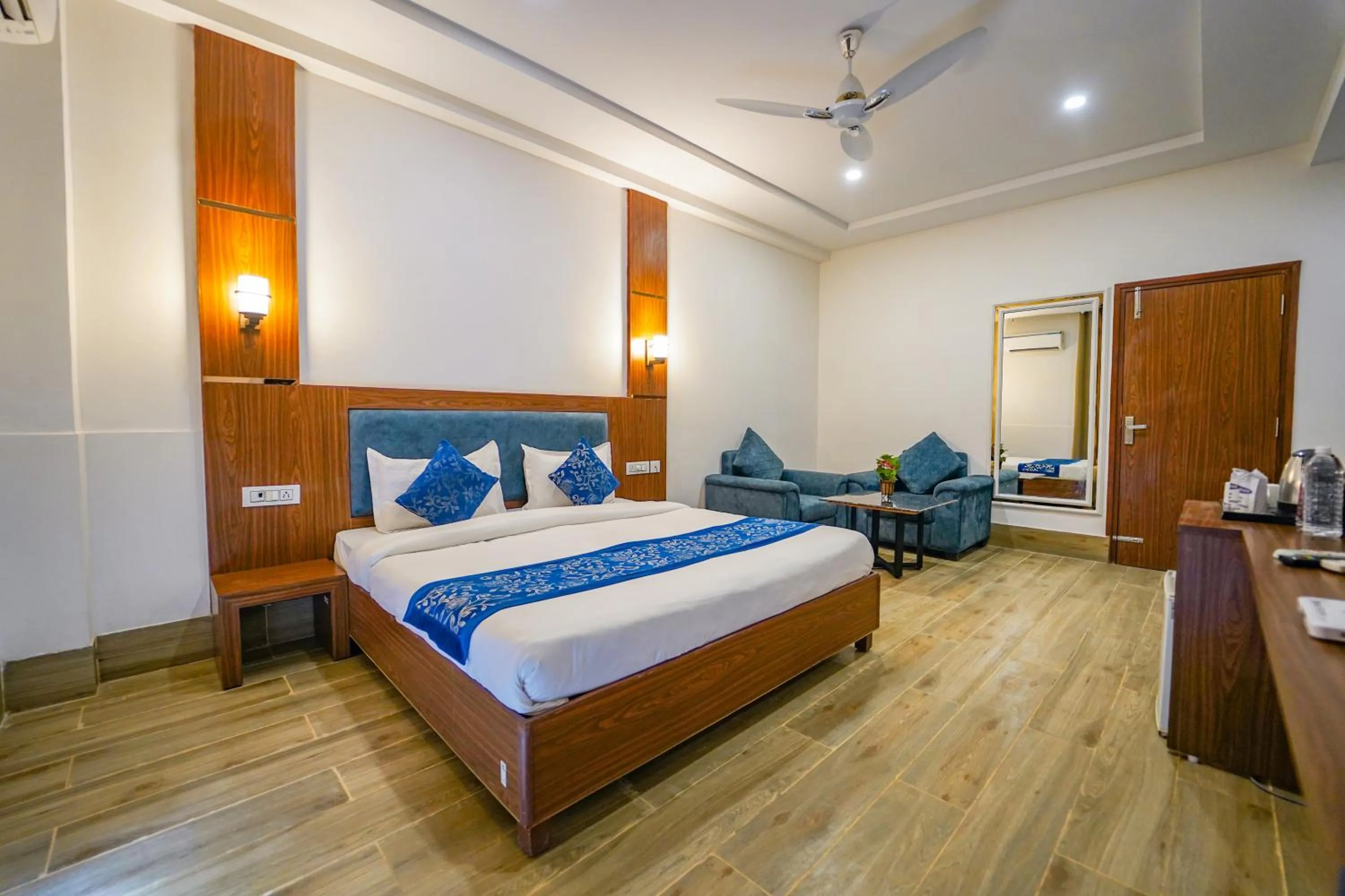 Bed in Vrinda Anandam Resort