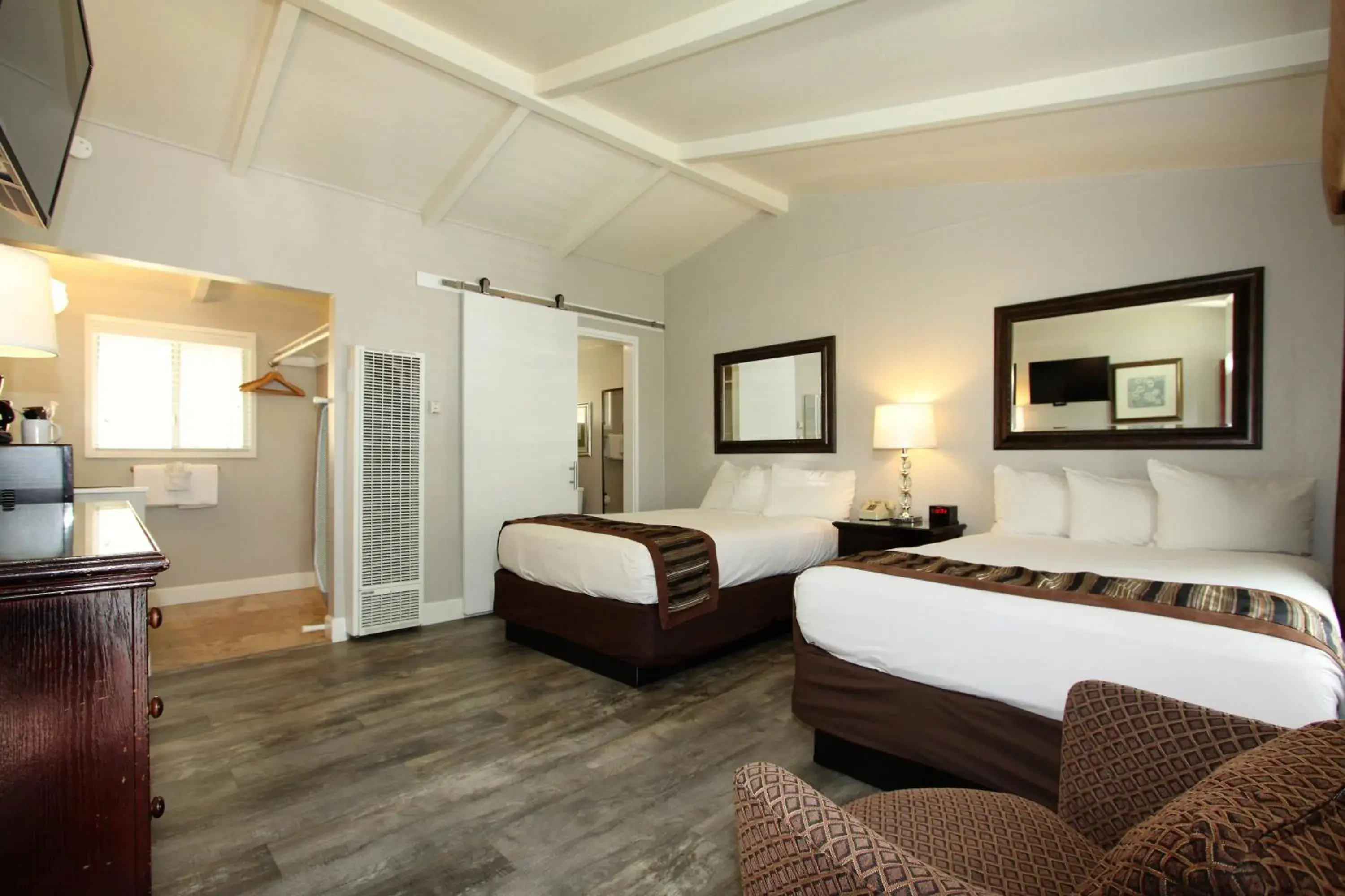 Bed in Monterey Peninsula Inn Bed in Monterey Peninsula Inn