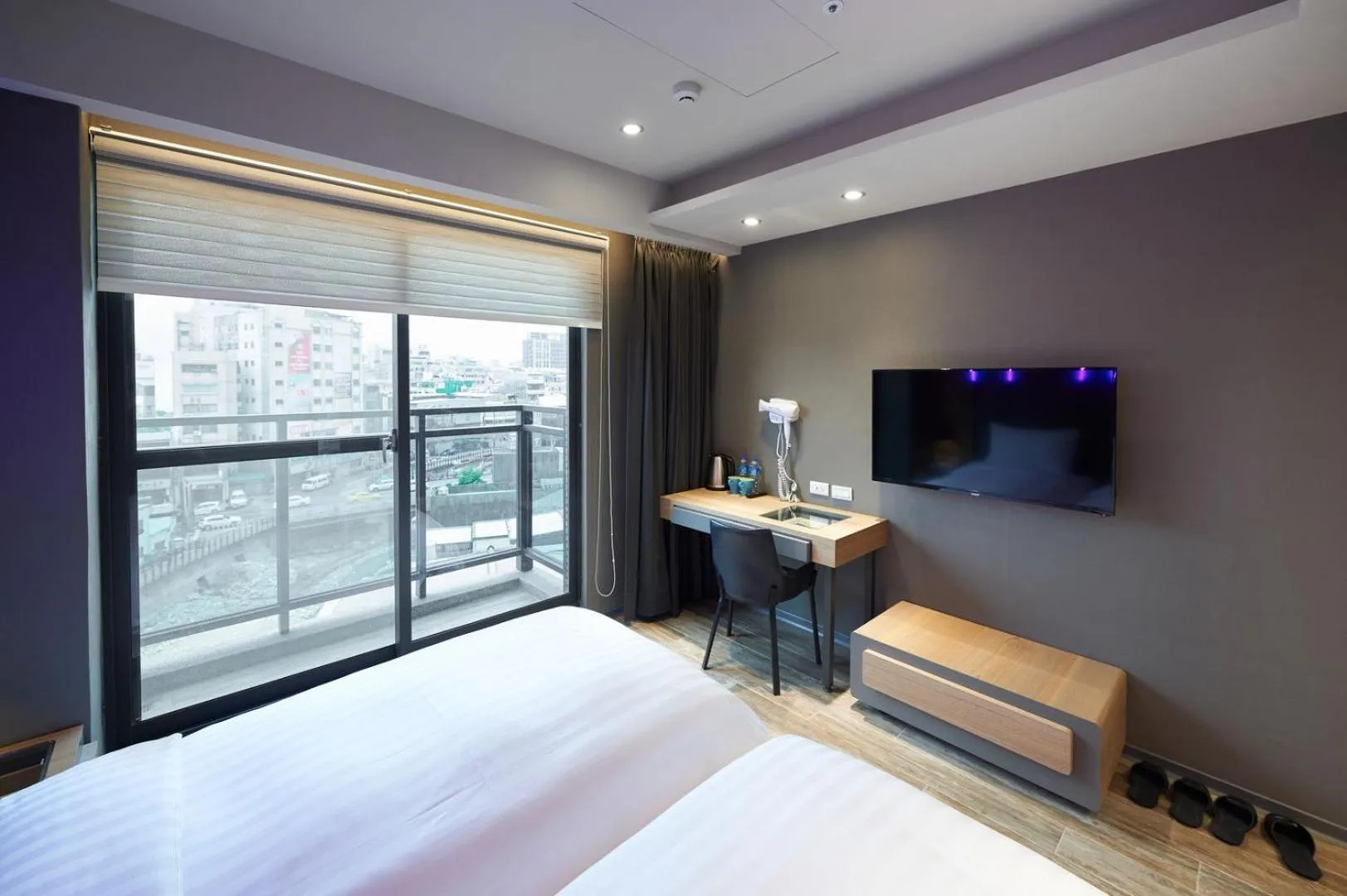 Bed in KIWI SHARE HOTEL ZHONGLI